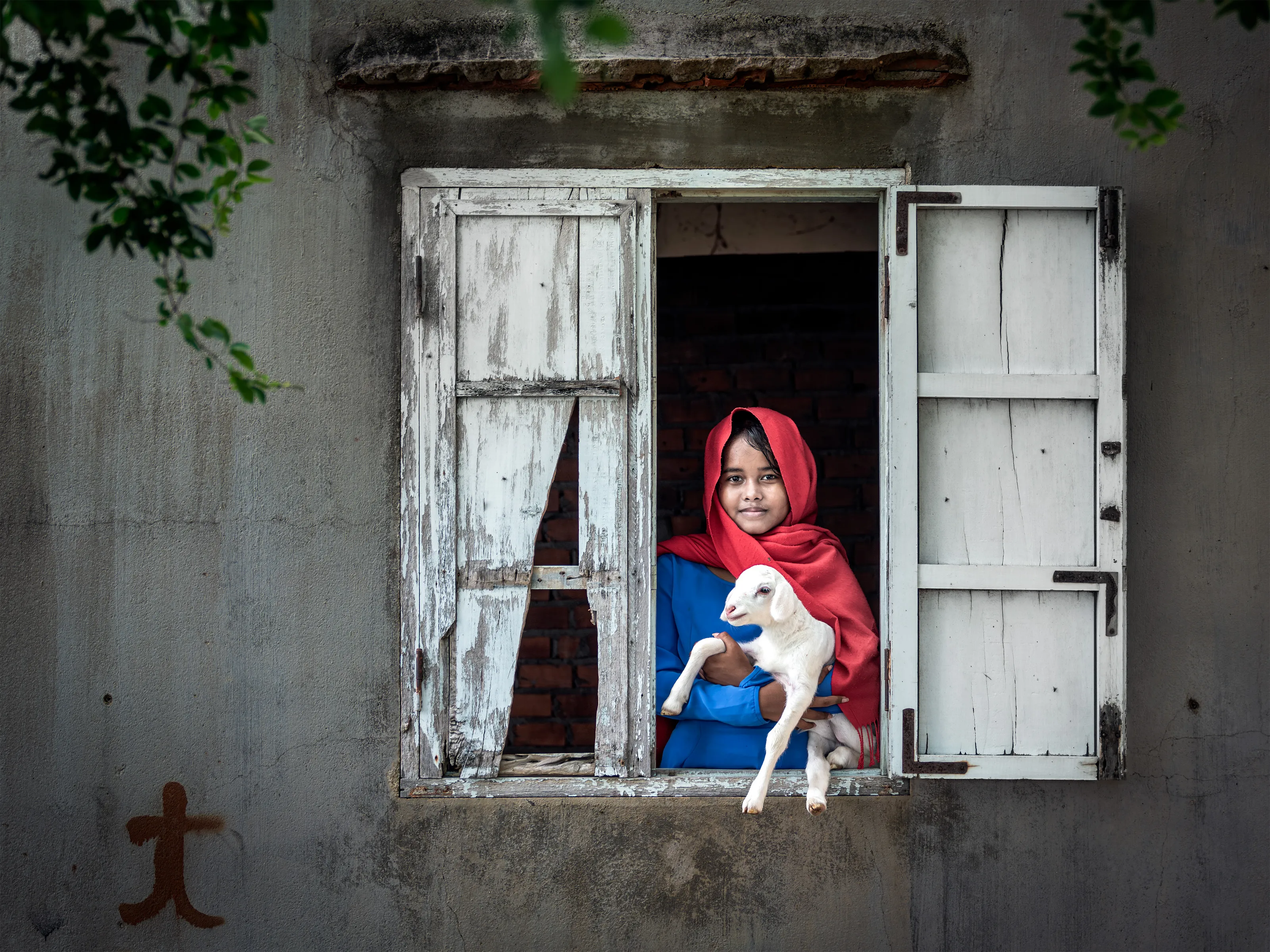 Little girl and lamb
