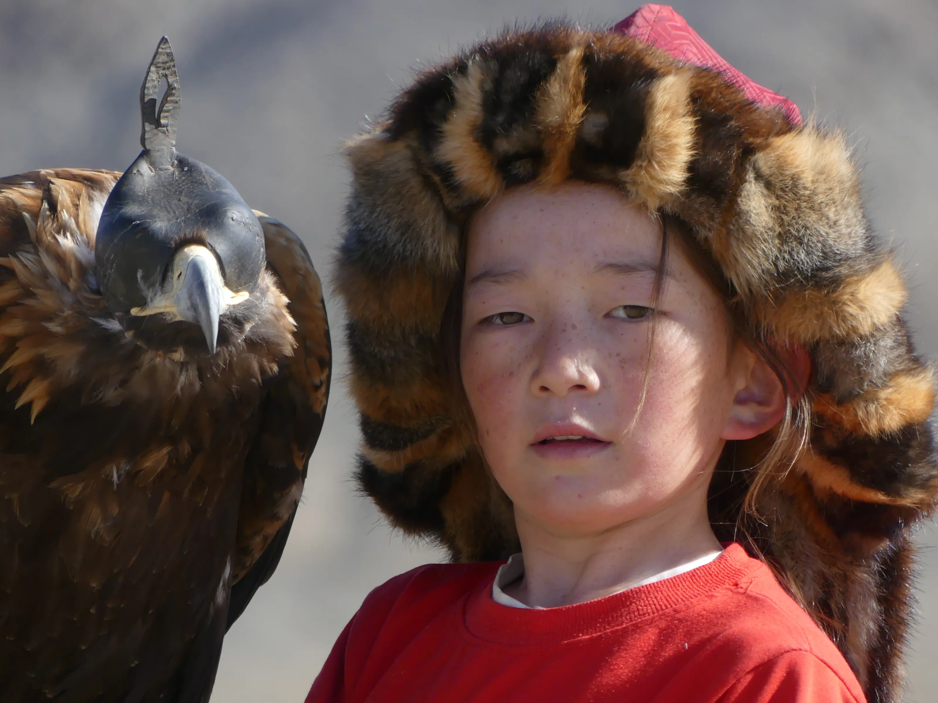 young Kazakh with her eagle