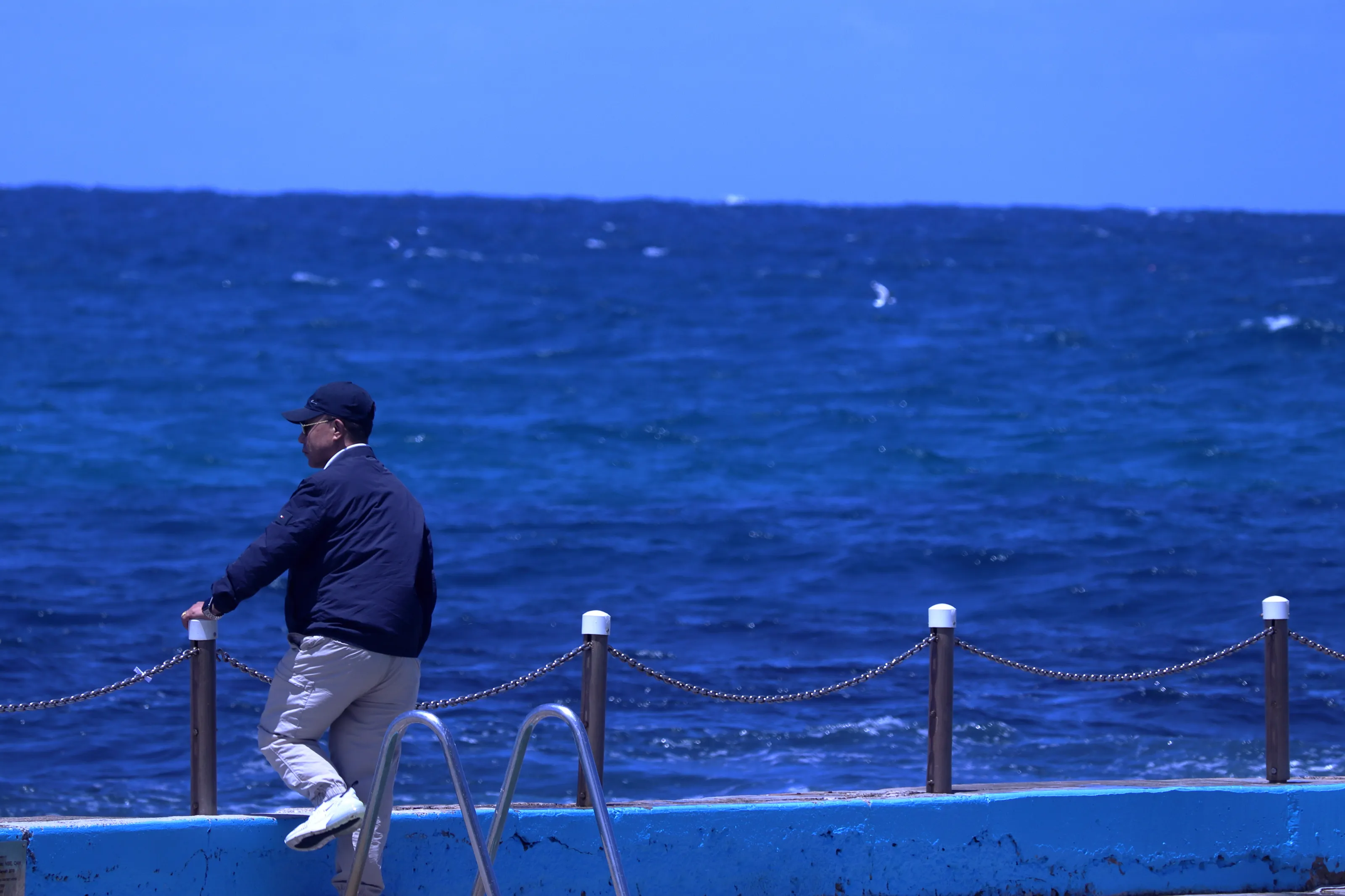 Guy looking out onto the water