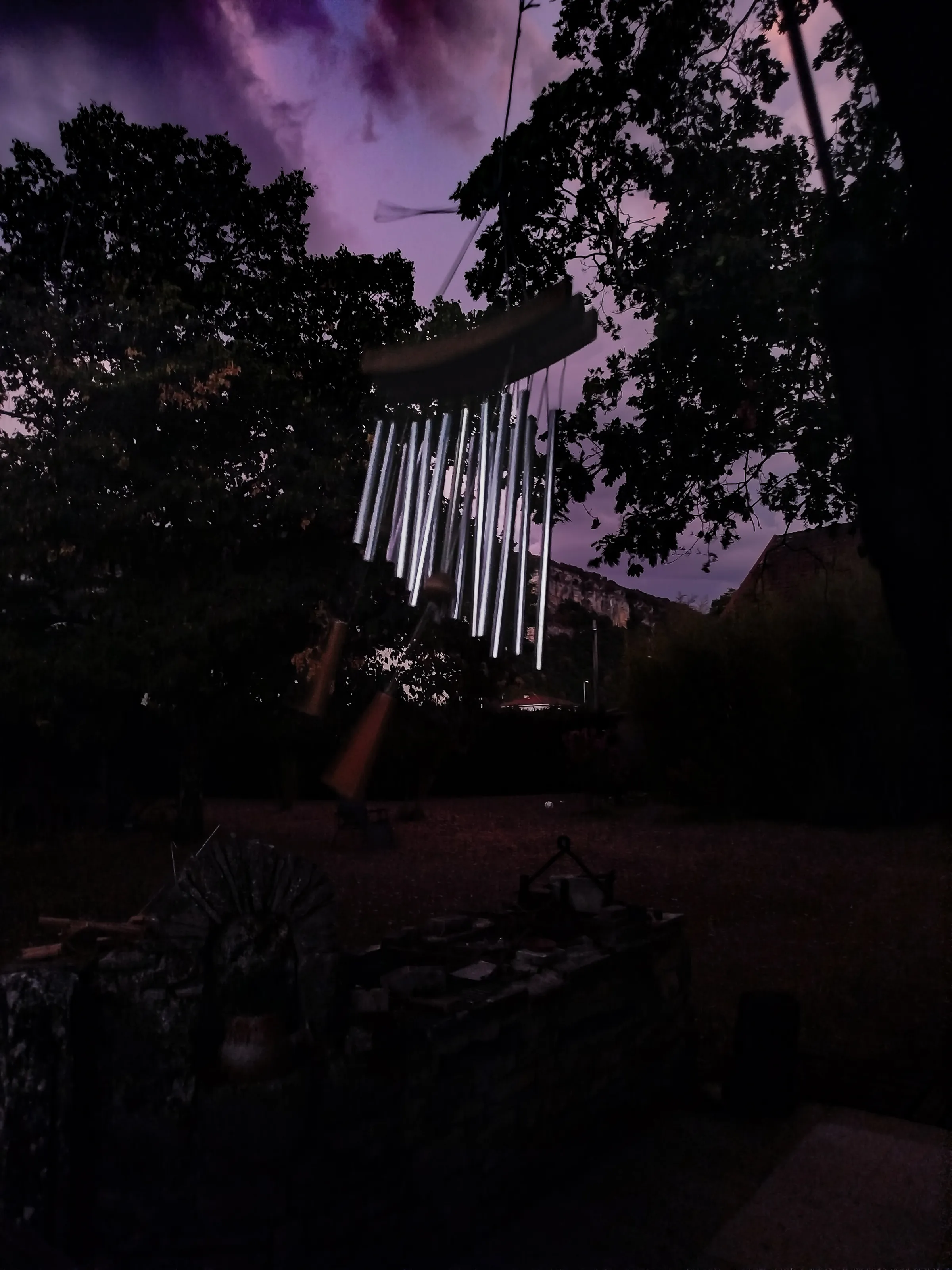 Chime and wind.