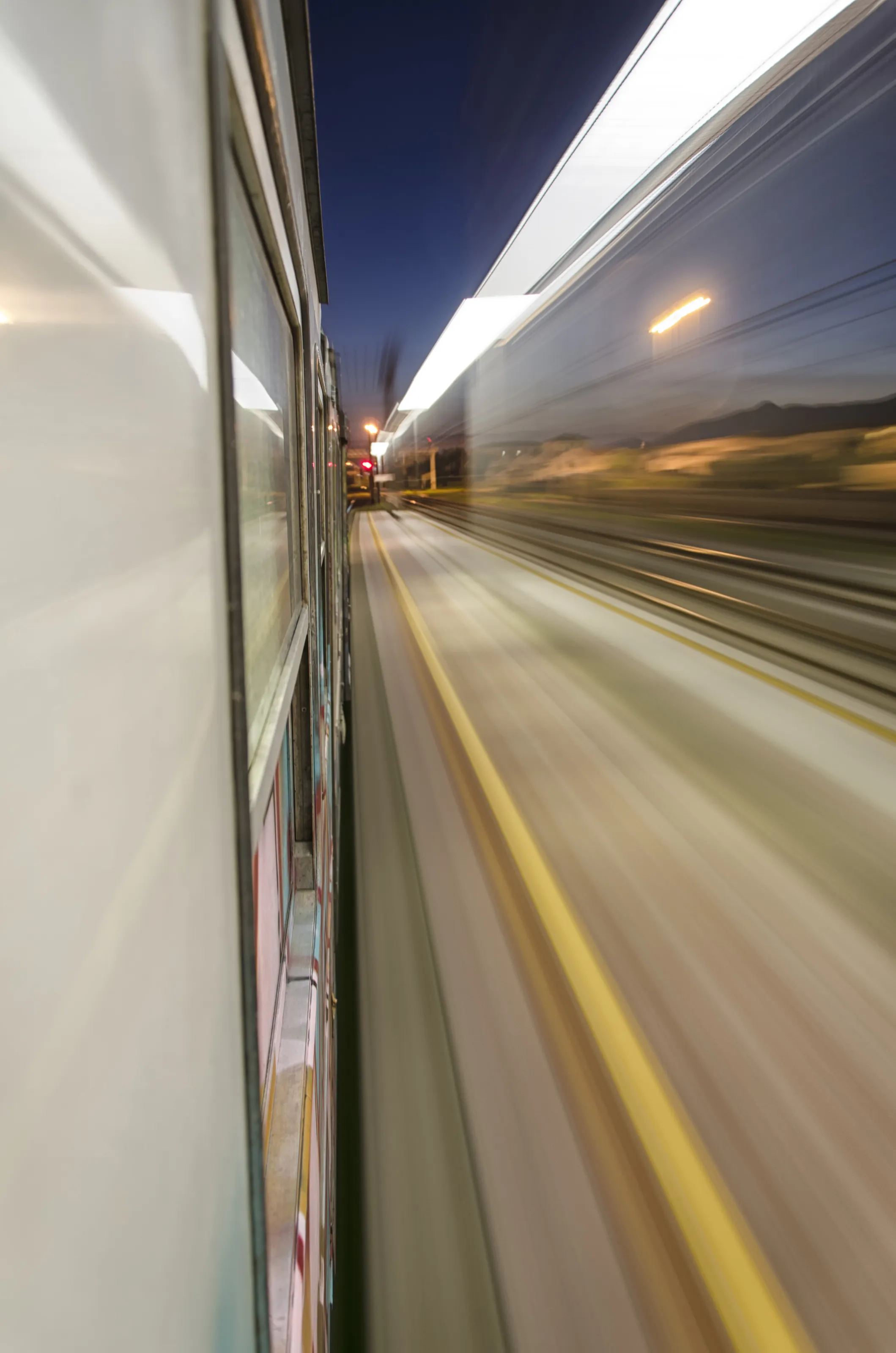 Train at full speed crossing the station