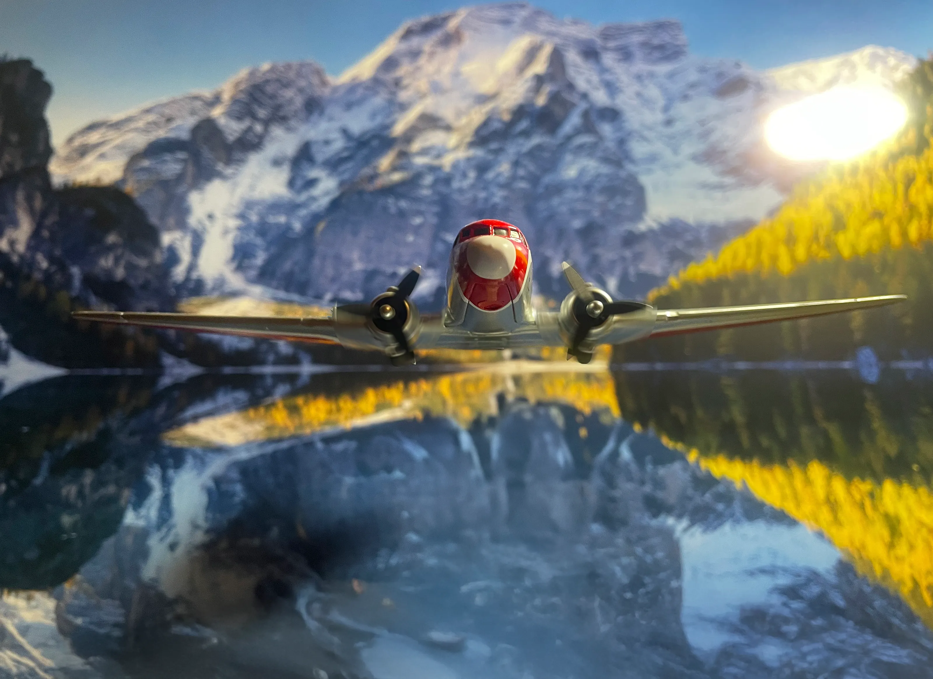 DC3 over an Alpine lake
