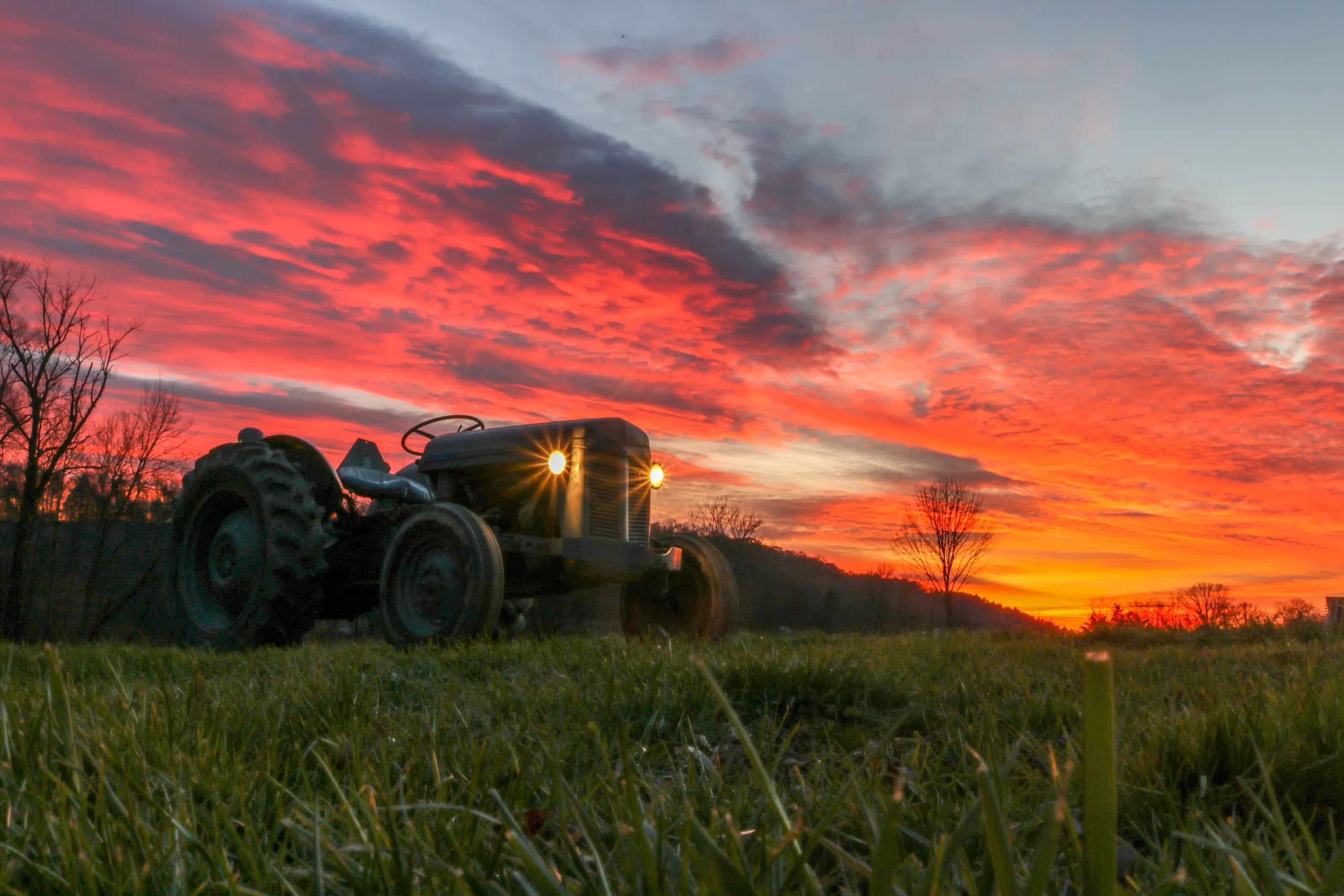 Sunset with tractor- 15 year old photo enthusiast!