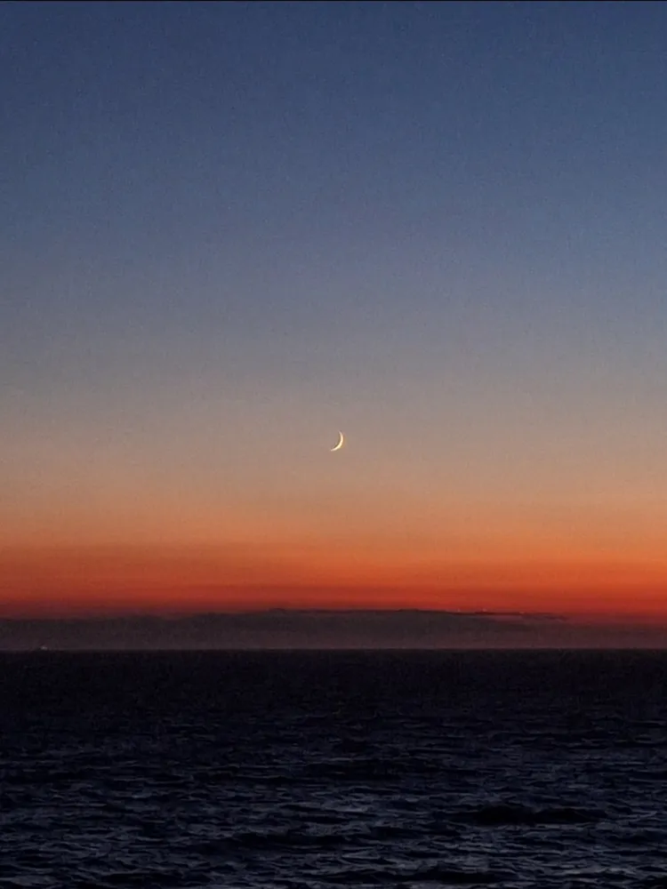 moon on the sea at sunset