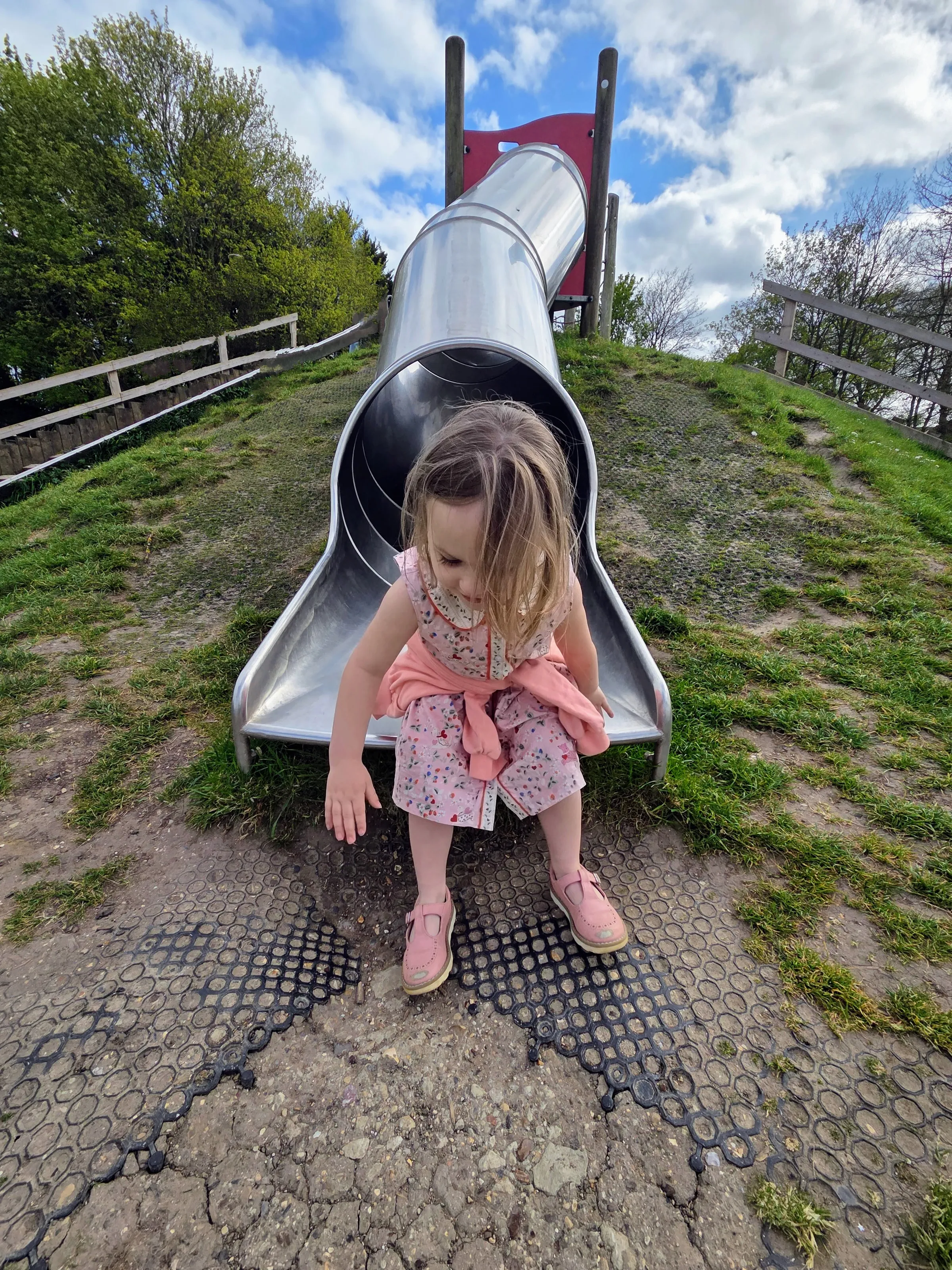 Children Playing on Playground Equipment