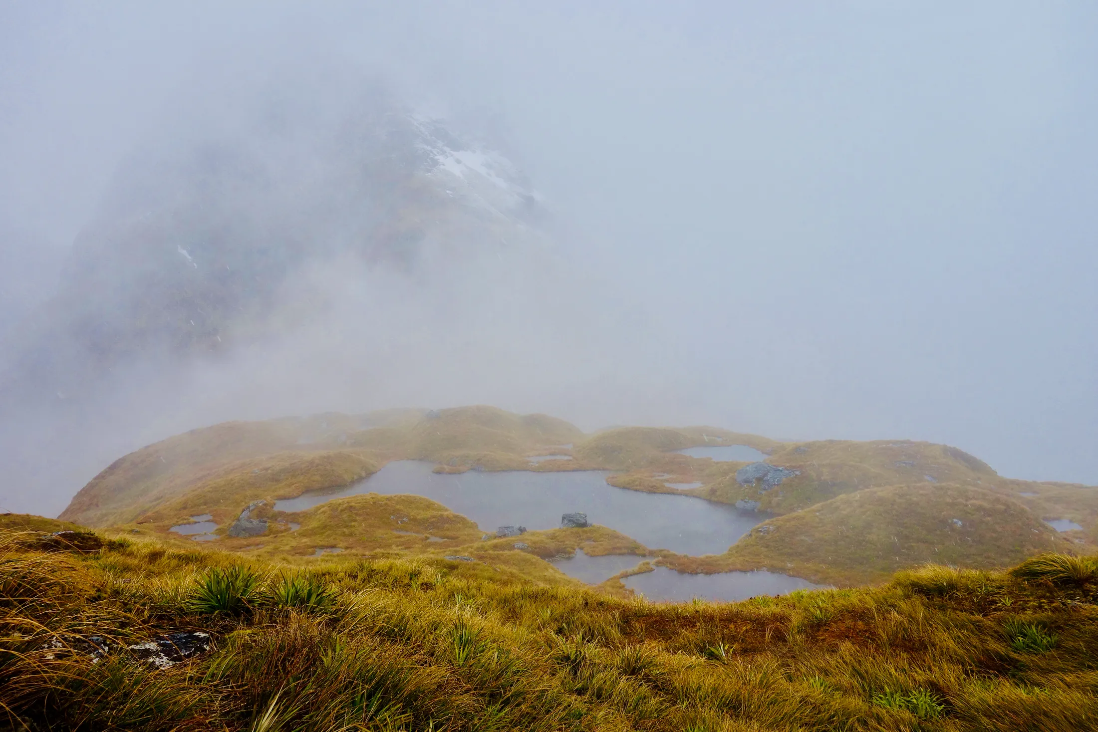 Lost in the clouds at MacKinnon Pass