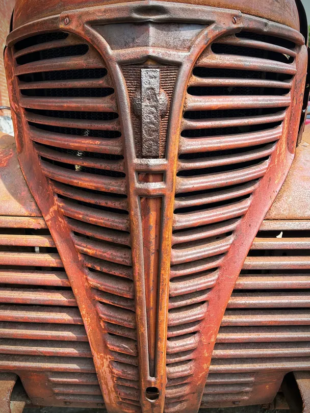 Rusted metal grille from vintage truck
