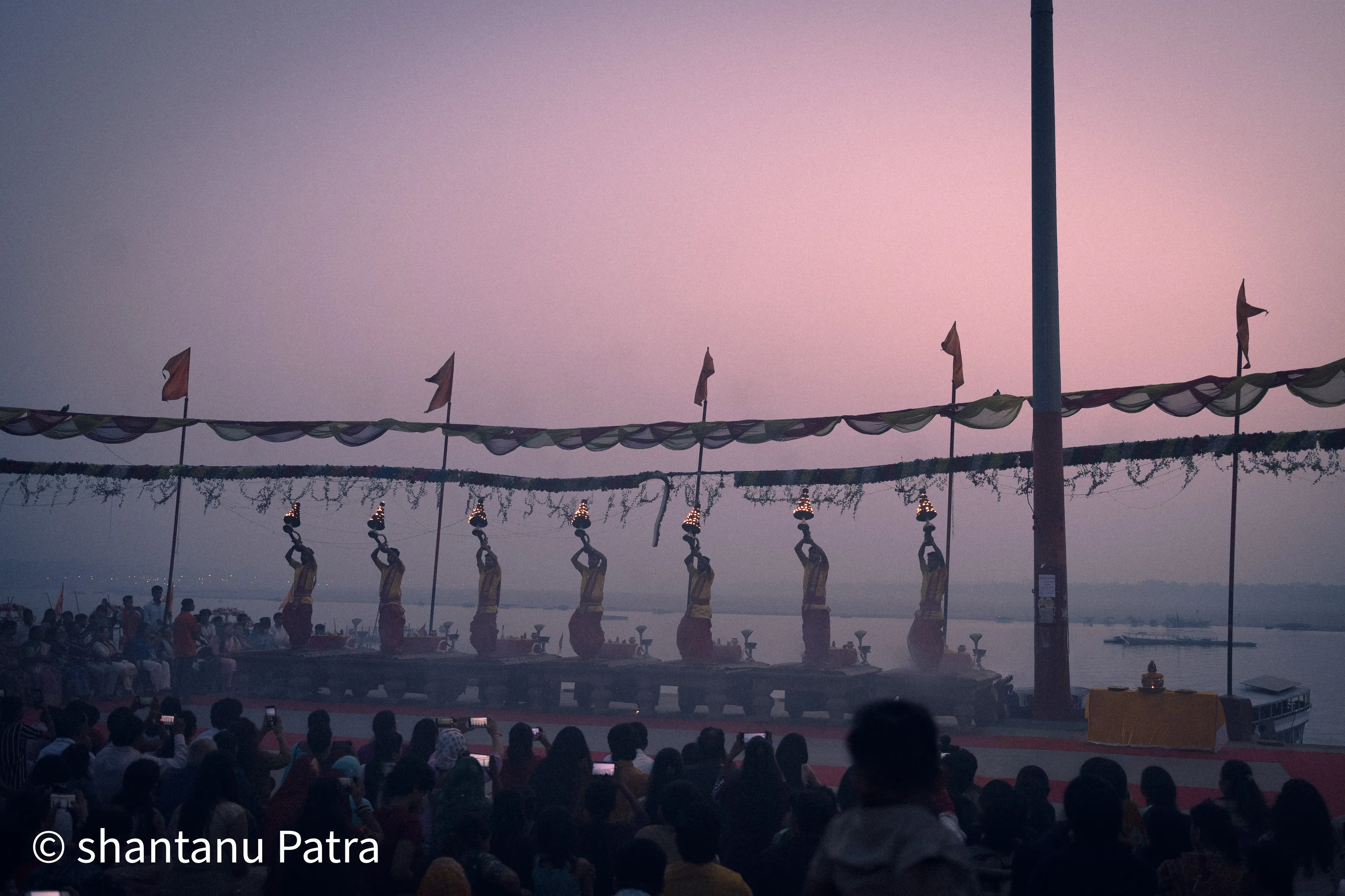Flames rise with sacred chants as twilight paints the Ganga in shades of devotion and peace.
