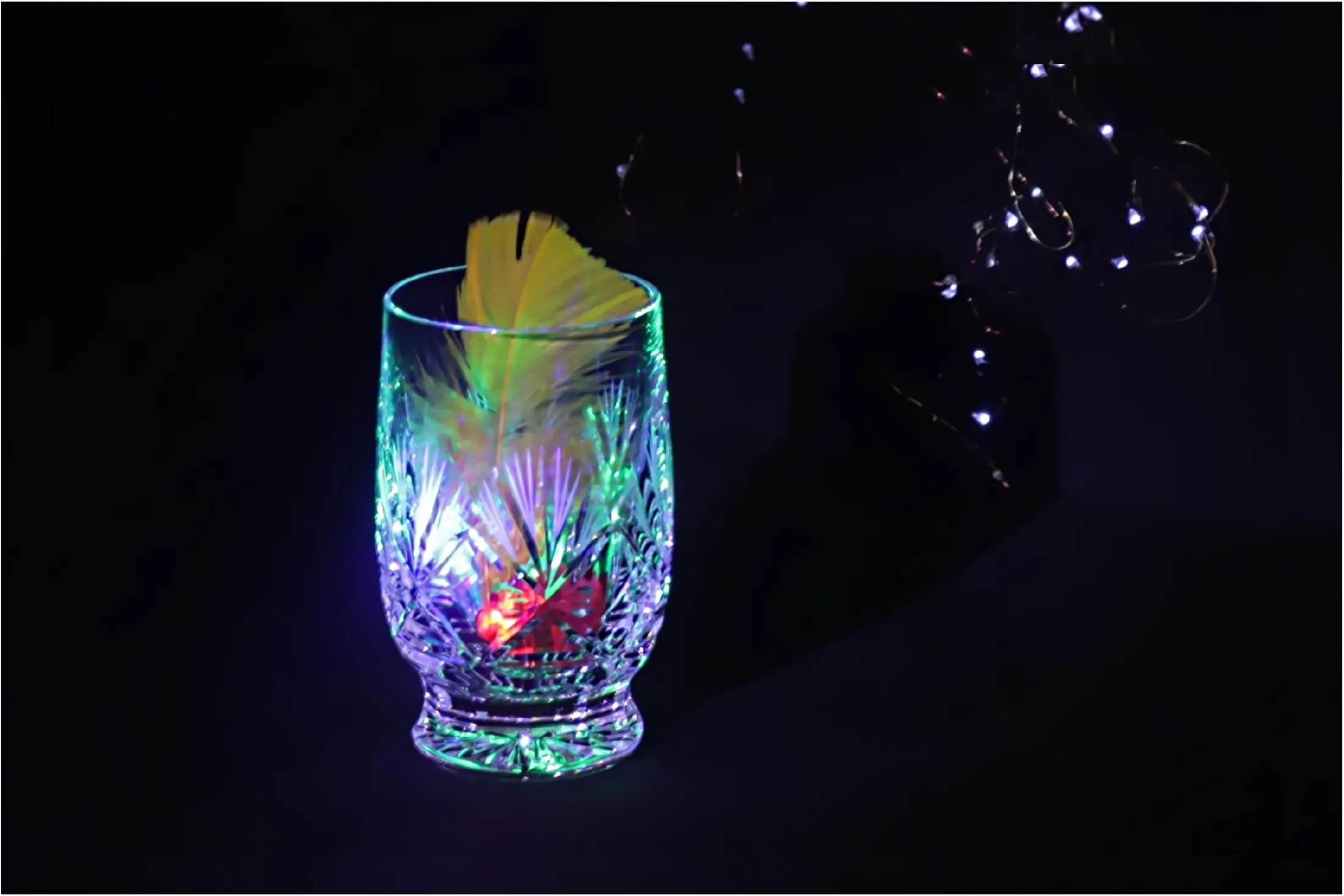 Feather in a glass
