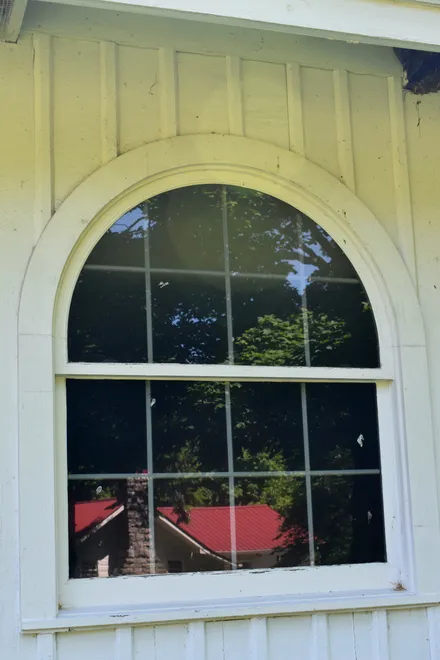 Reflection of Barn in Window