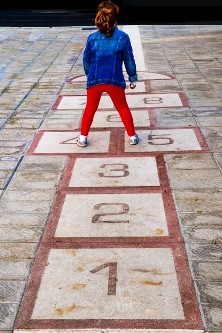 Girl at playground equipment