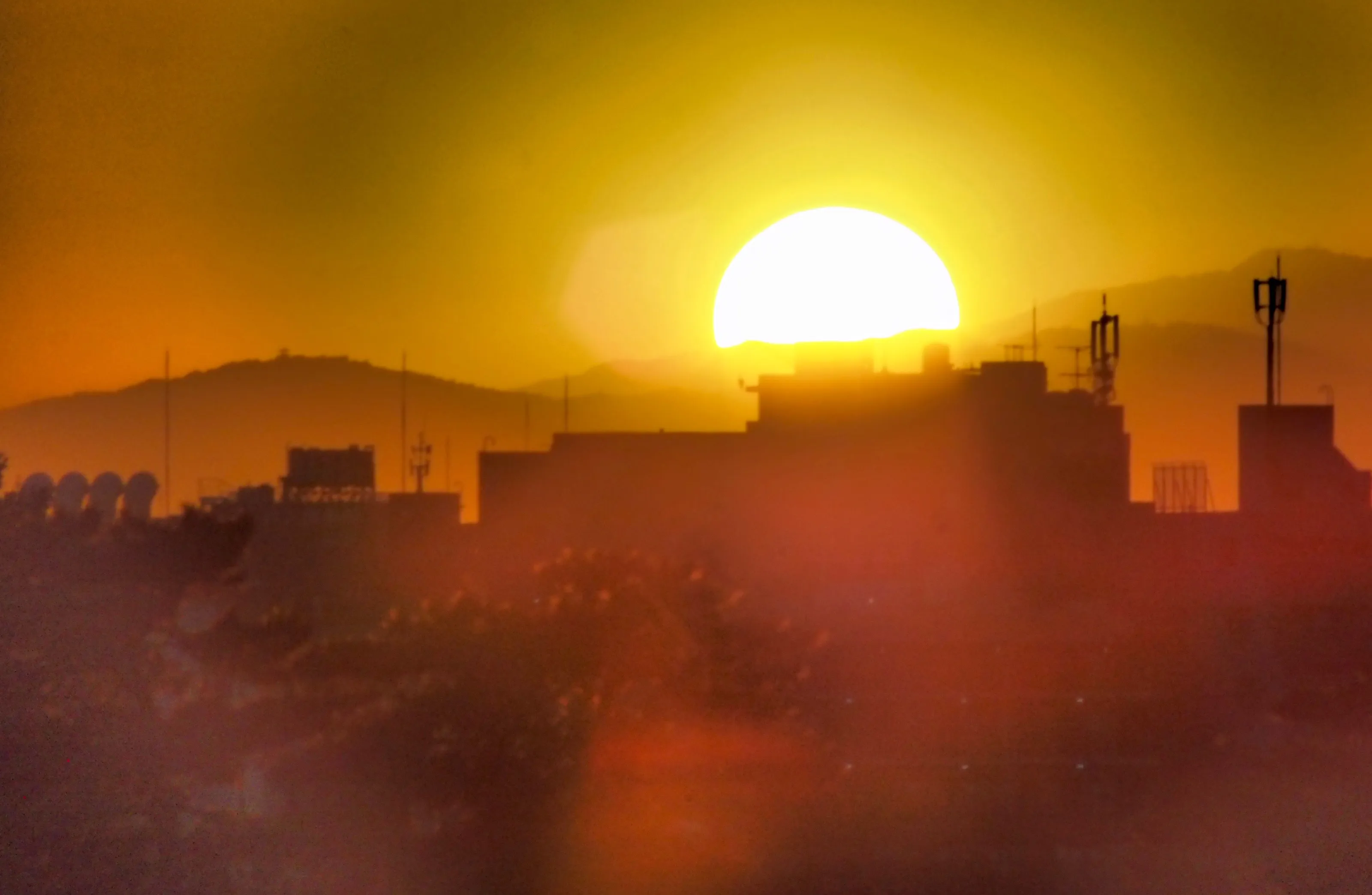 "The sun sets over the Tokyo desert"