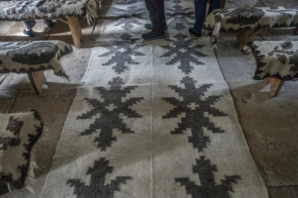 Floor and bench textile coverings. Saints Michael and Gabriel, church, Plopis, Romania, Maramures