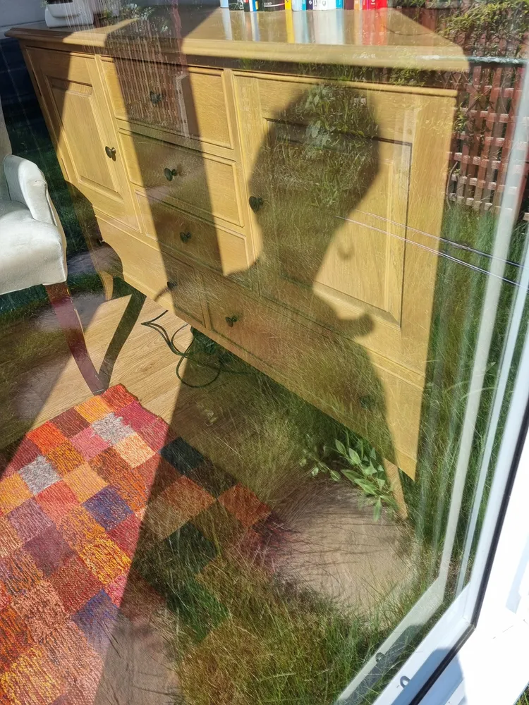 Shadow through the glass