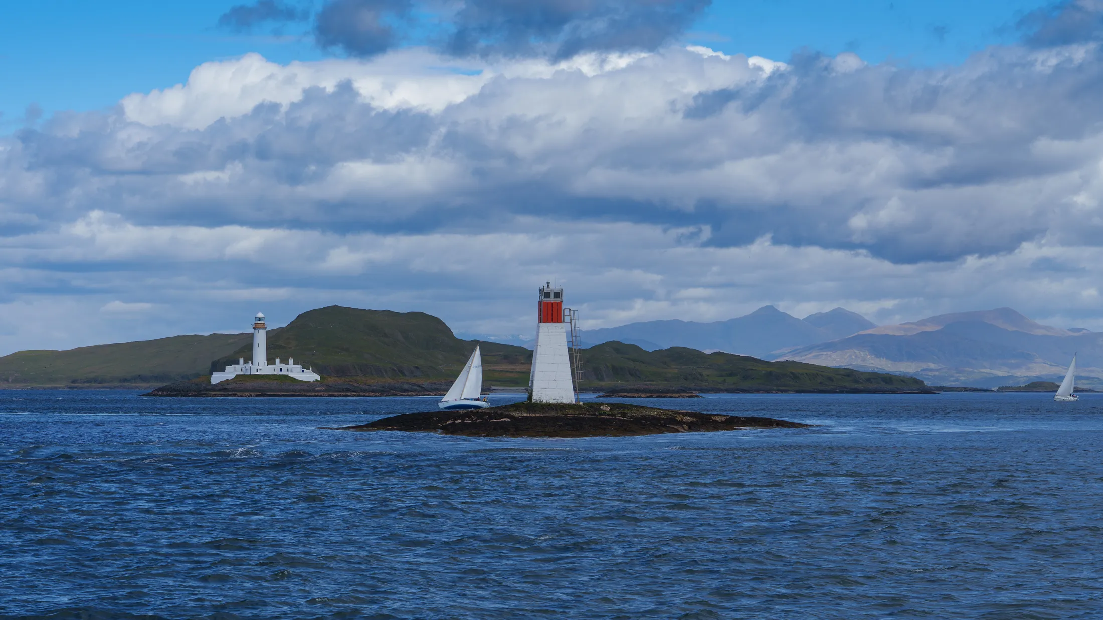Lady's Rock Beacon, Lismore Lighthouse and Sailing Boat 1