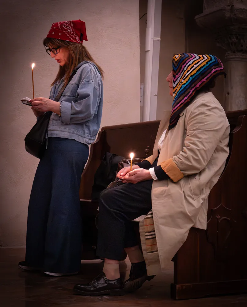 Worshipers in the crypt of St Nicholas, Bari
