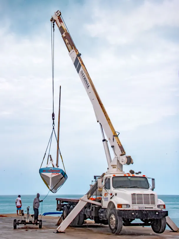 Crane Moving a Sloop - 1