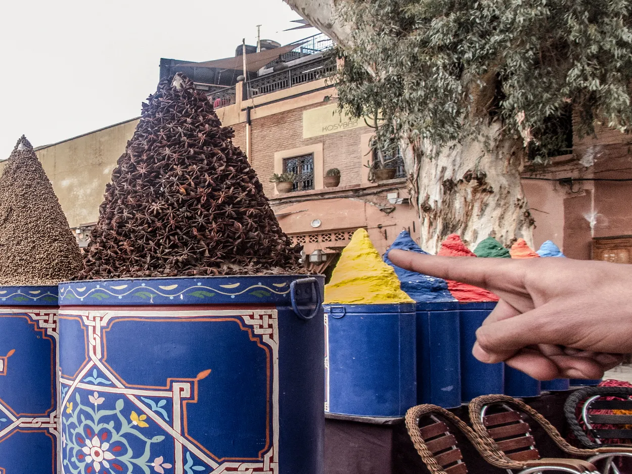 Finger pointing. Spice stall, Ferblantier, Medina, Marrakech, Morocco