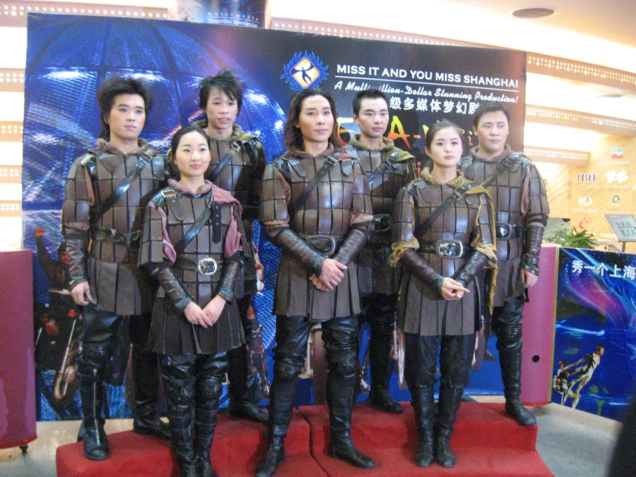 Cast of motorcycle act, Shanghai Acrobatic Theatre, Shanghai, China