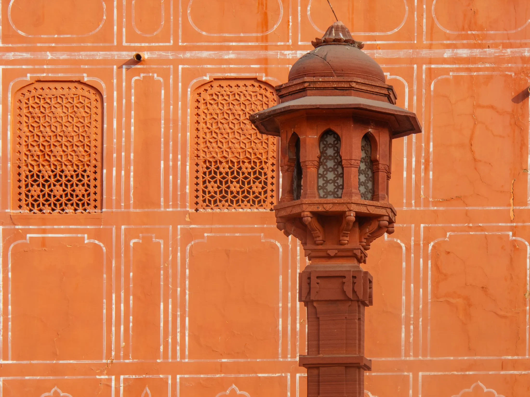 Lamp post and orange/pink wall, Jaipur, India