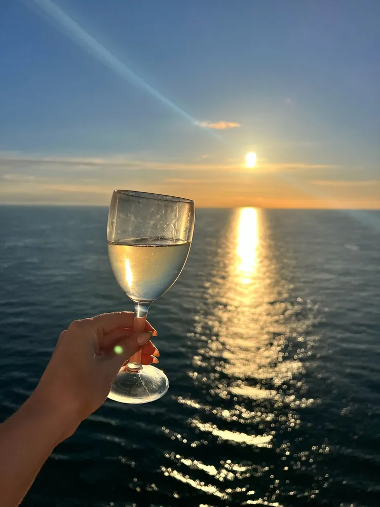 Wine with sunset on cruise ship