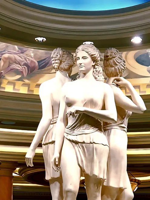 Three Figures on Statue