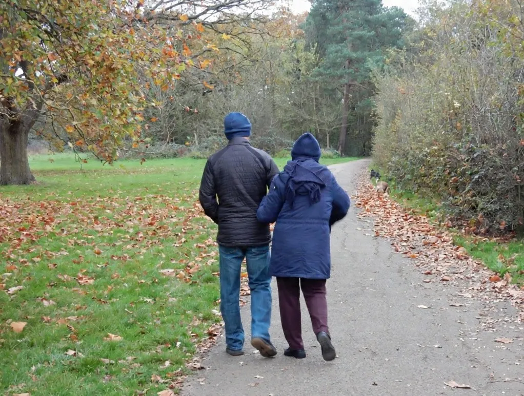 Mother & son walking