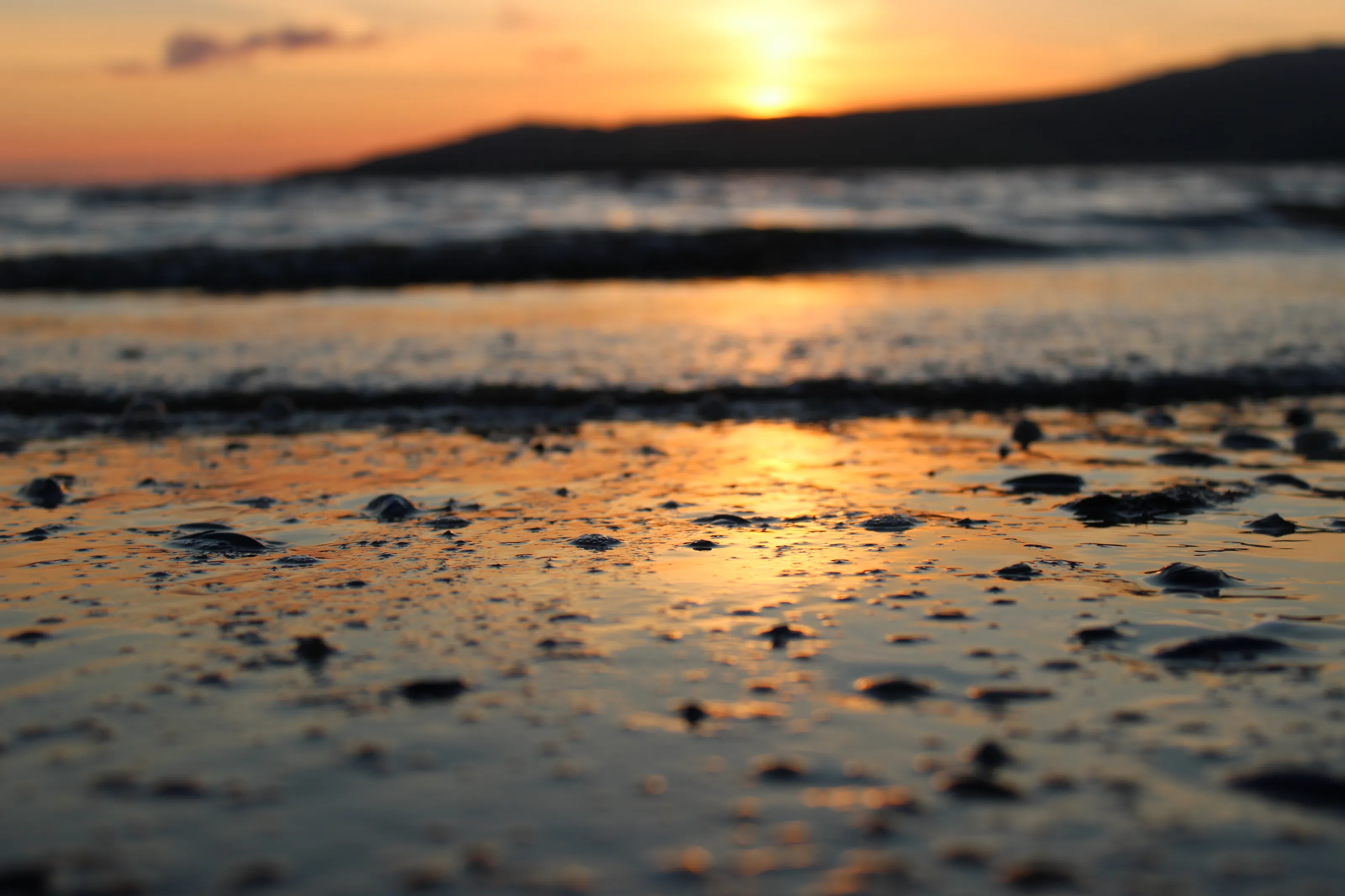 Sunset off the rocky cliff