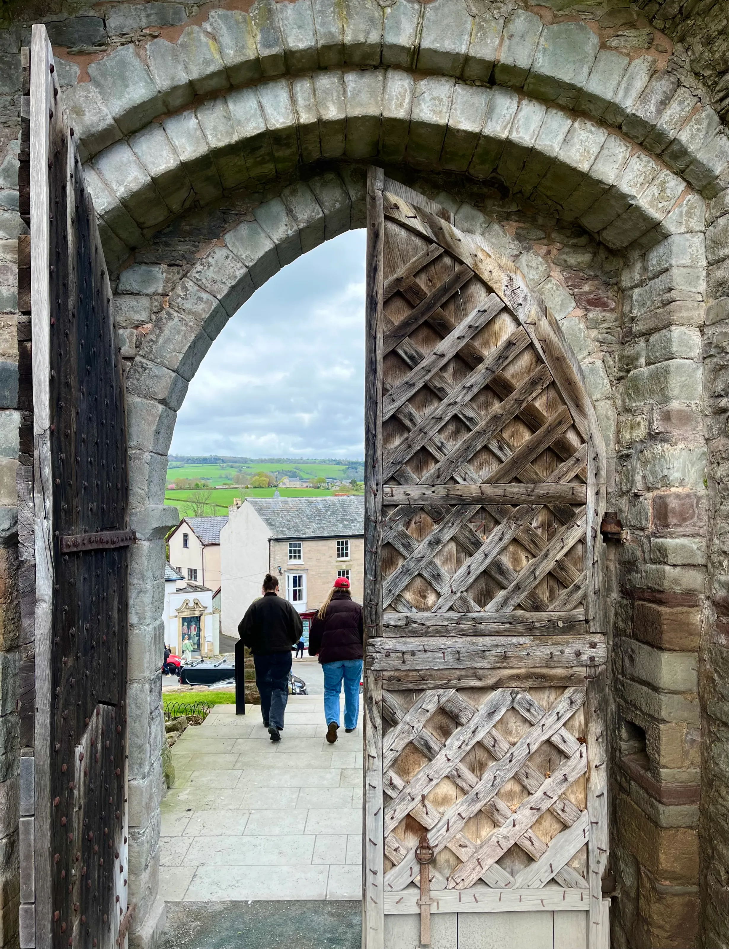 Walking out of the gates of Hay Castle, Wales