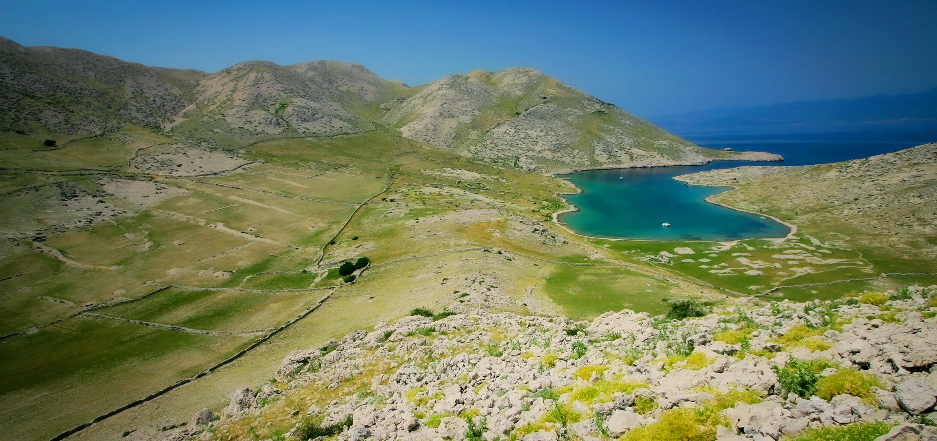 Blue lagoon in karst landscape