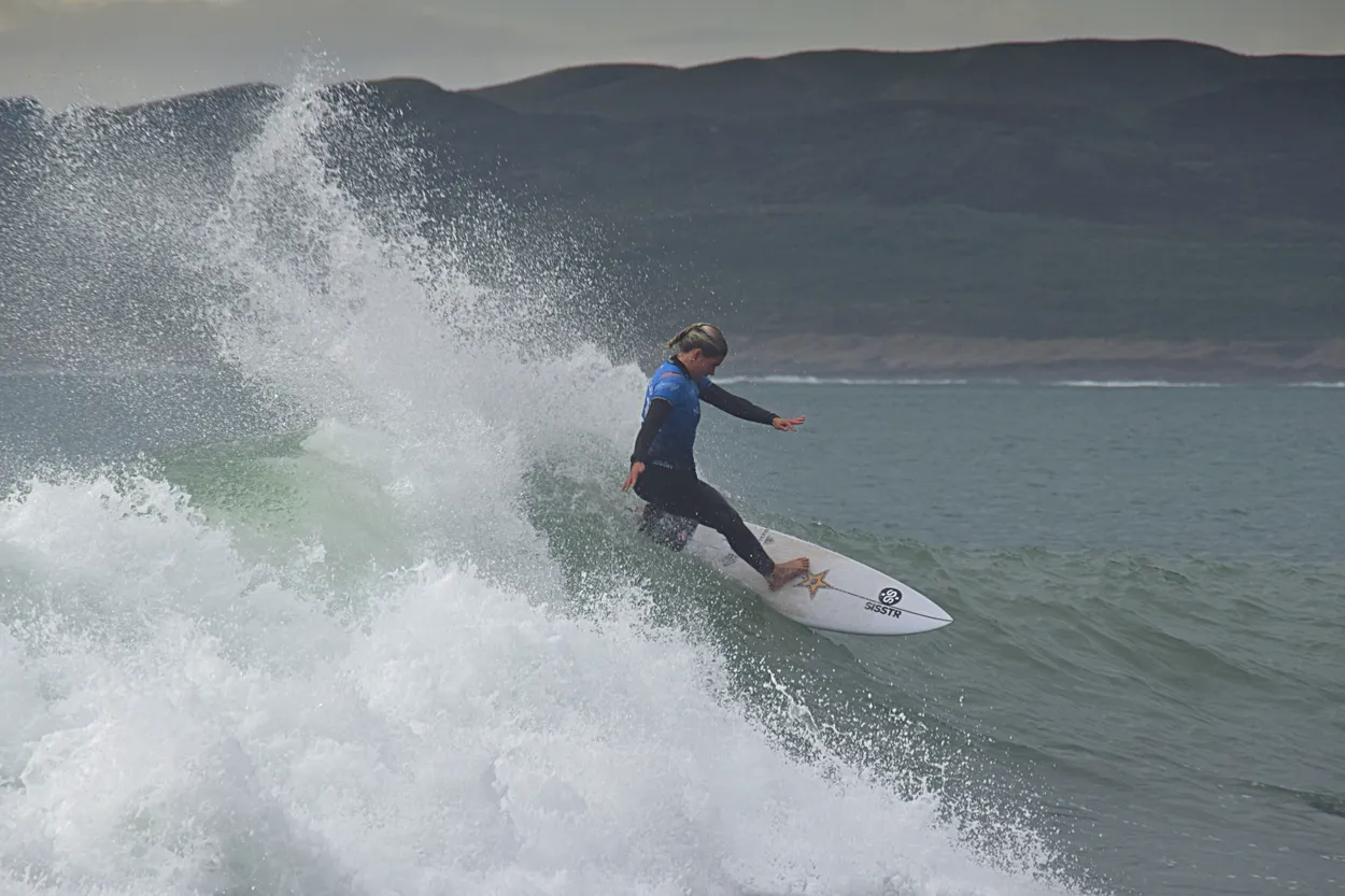 Sawyer Lindblad carving through the spray
