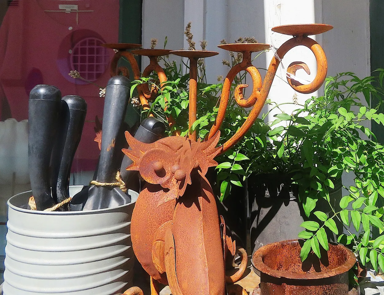 Rusty owl,pot and candlesticks