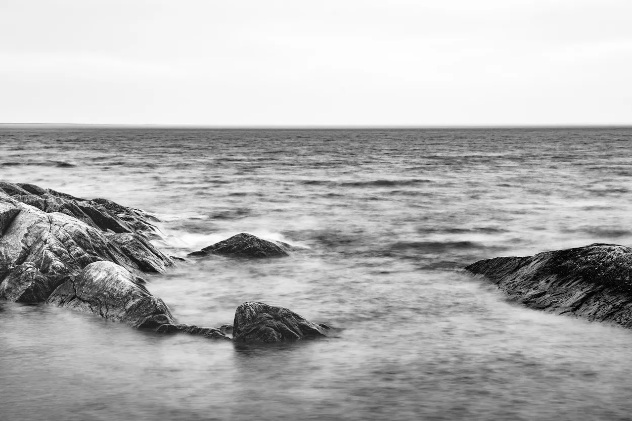 Long exposure image of rocks in the sea