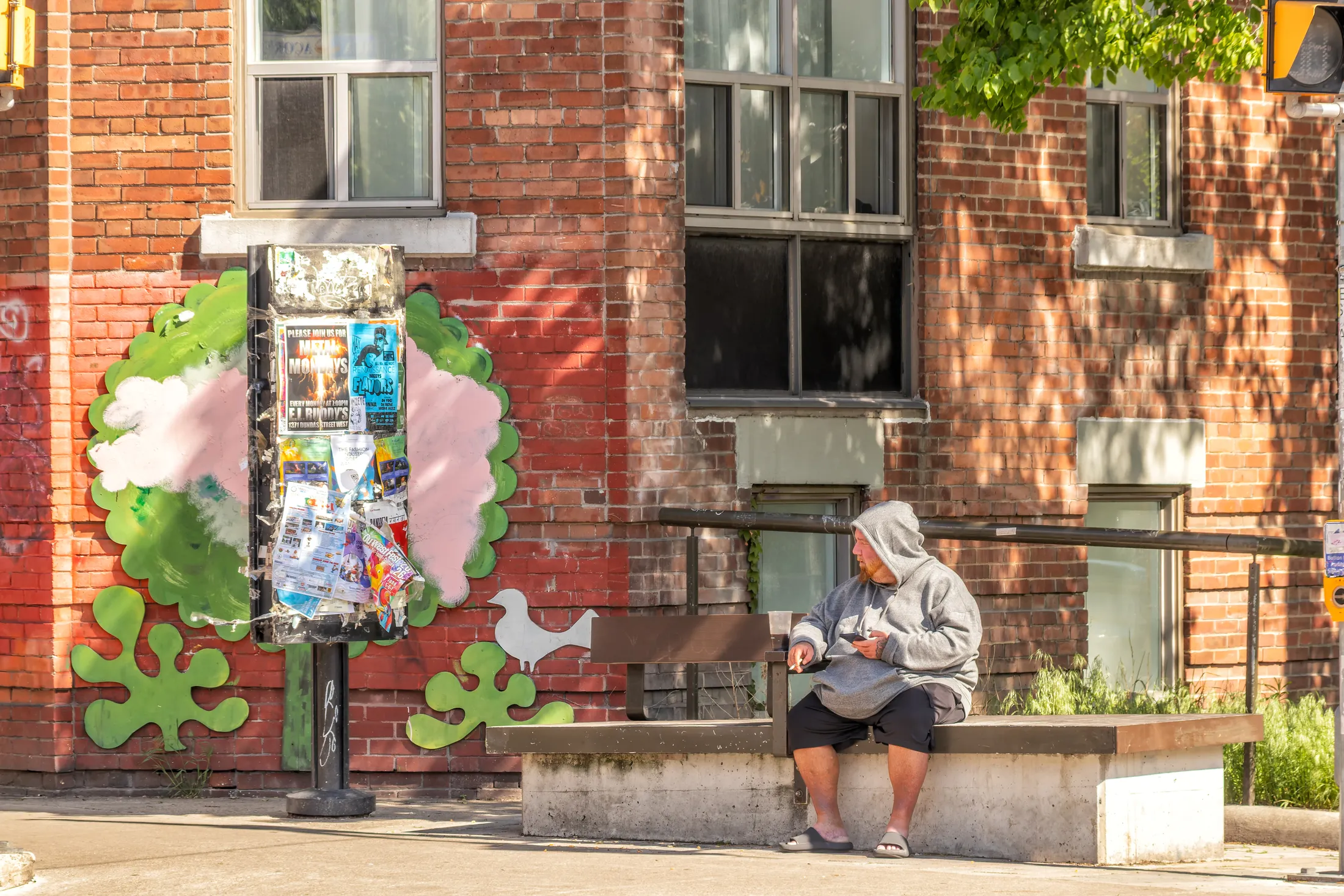 Man on a Concrete Bench