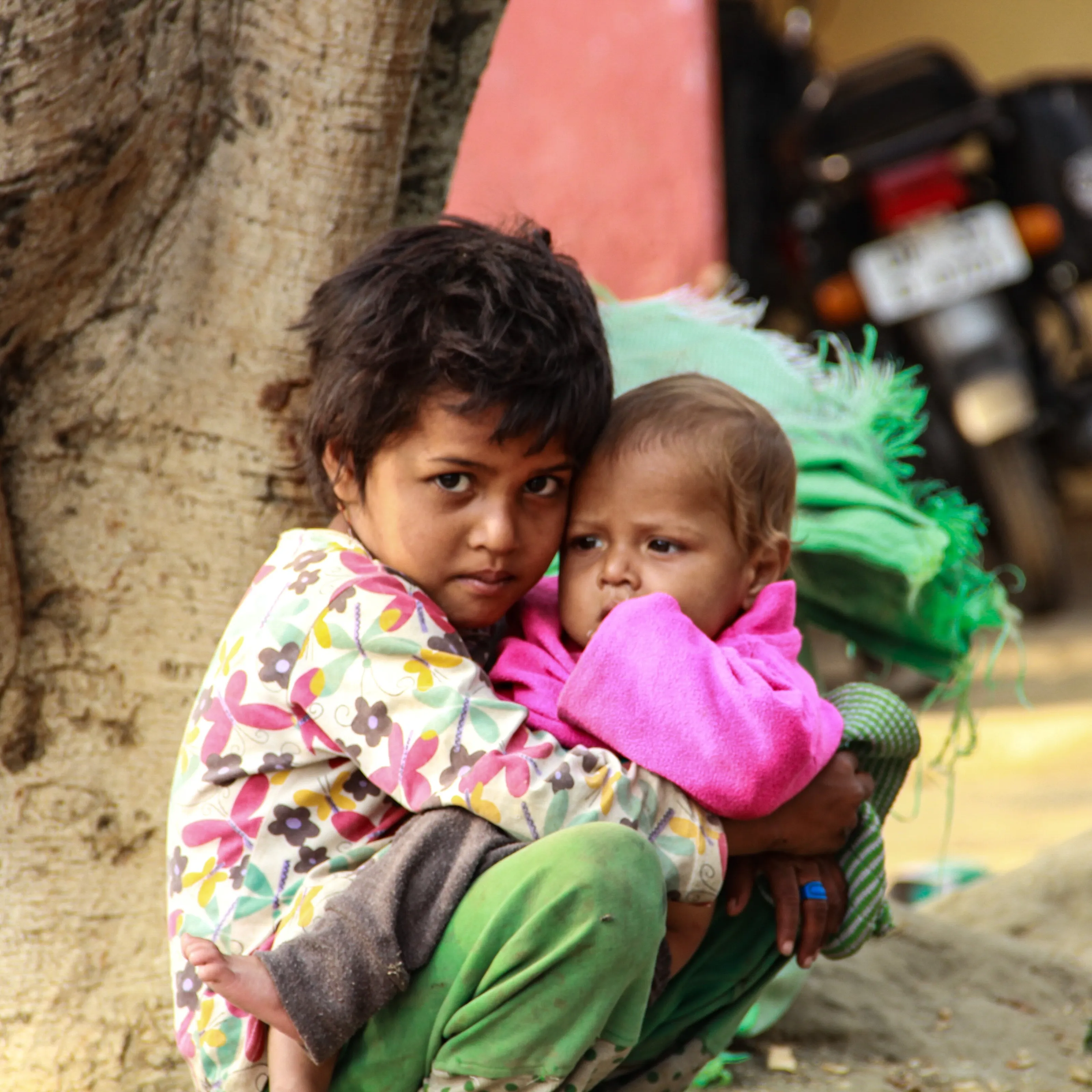 Present - She is protecting his brother . Future - He will protect her sister