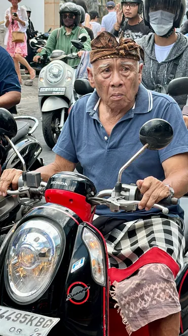 Old Man on Bike