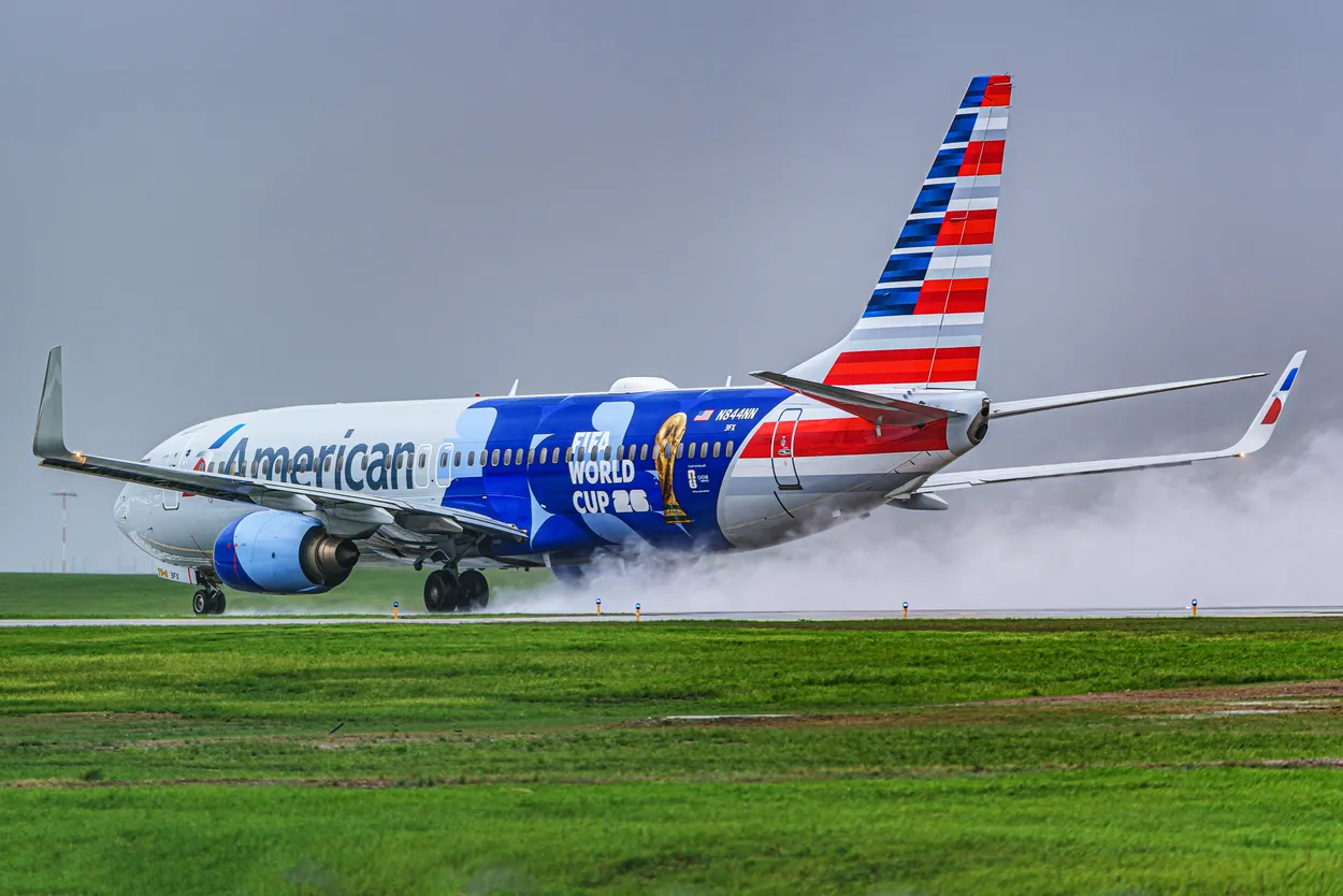 Boeing 737 Going Down the Runway on a Rainy Day