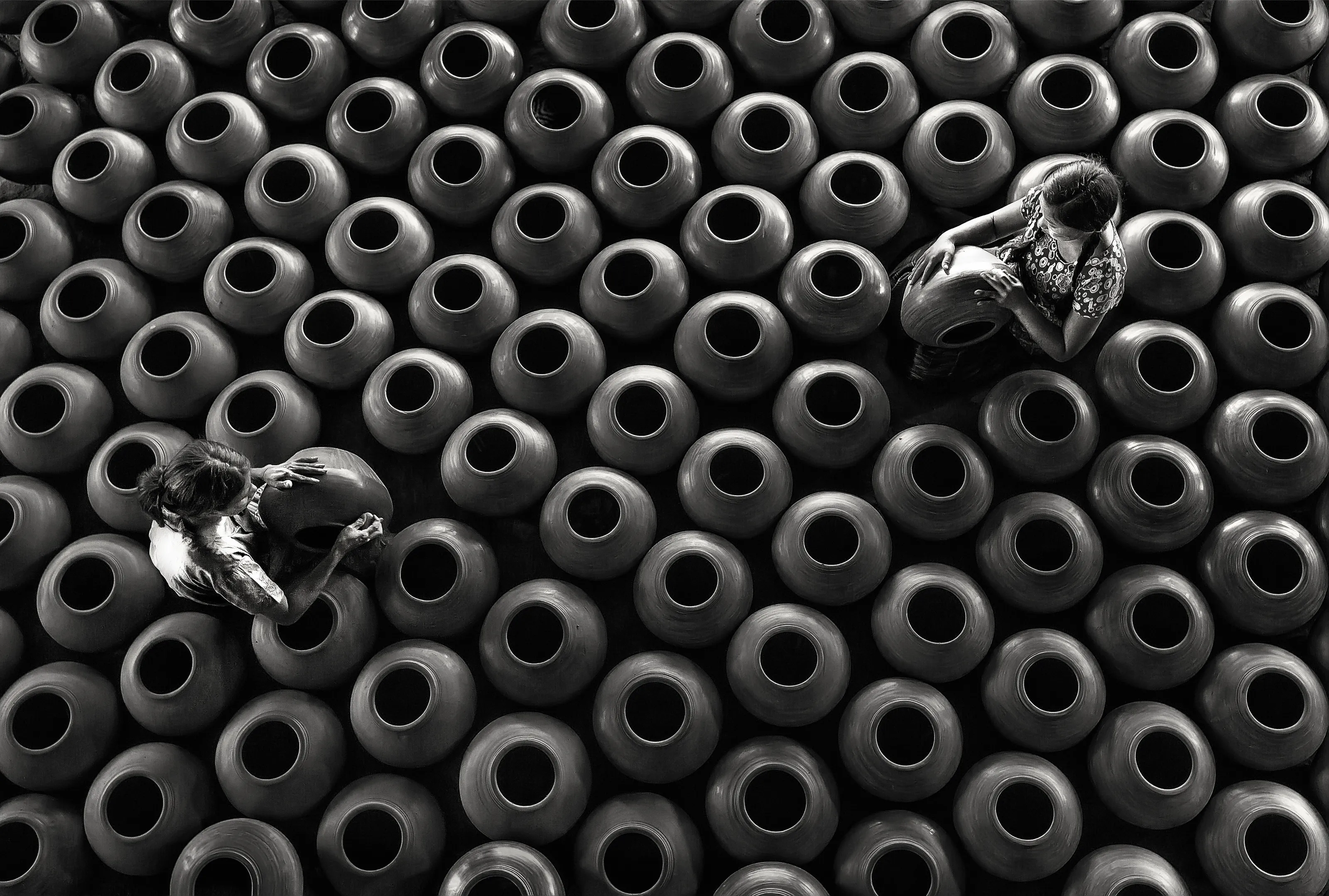 craftsmanship of Myanmar women pottery