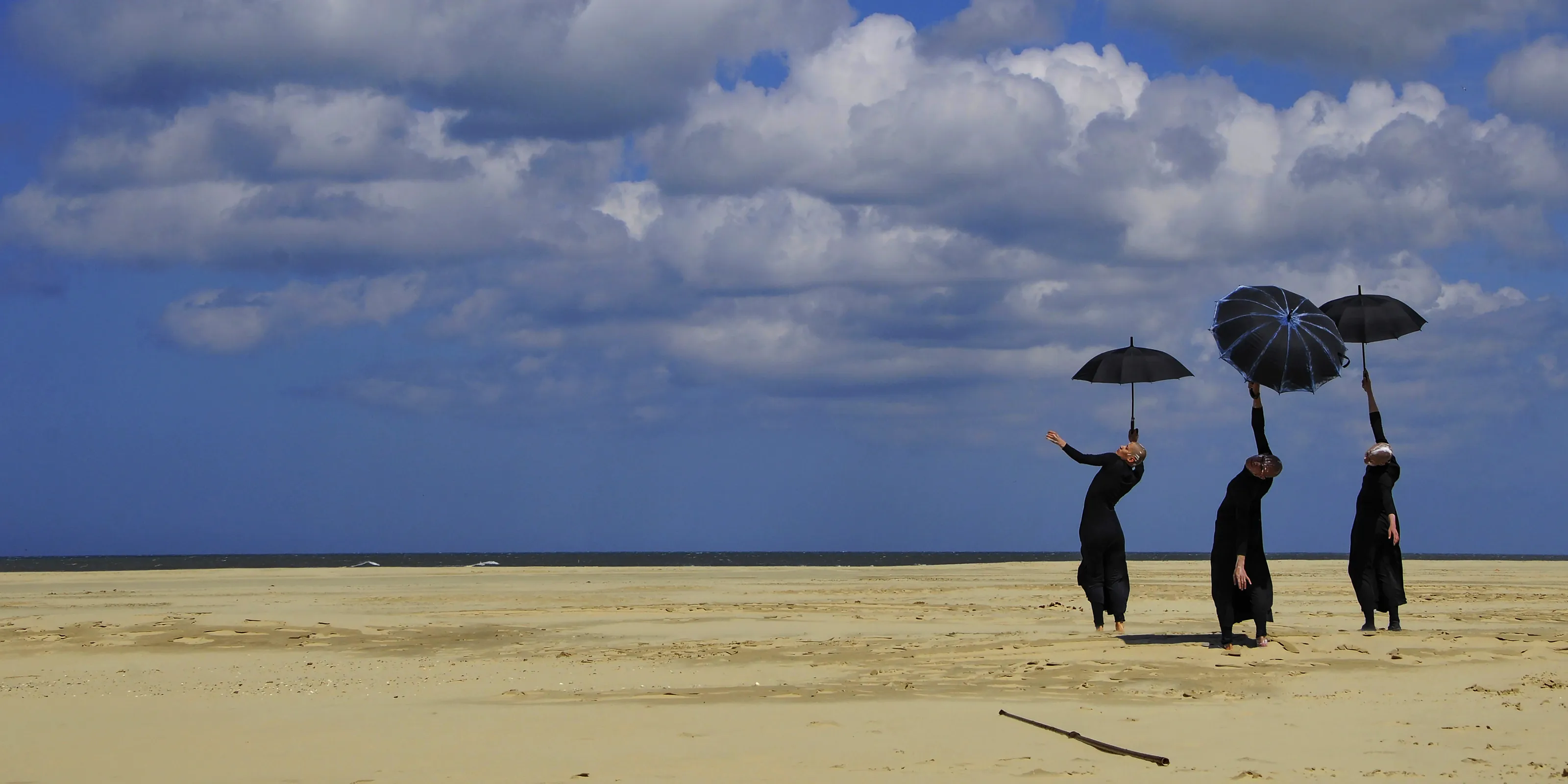 Waiting on the rain on a sunny day at the beach