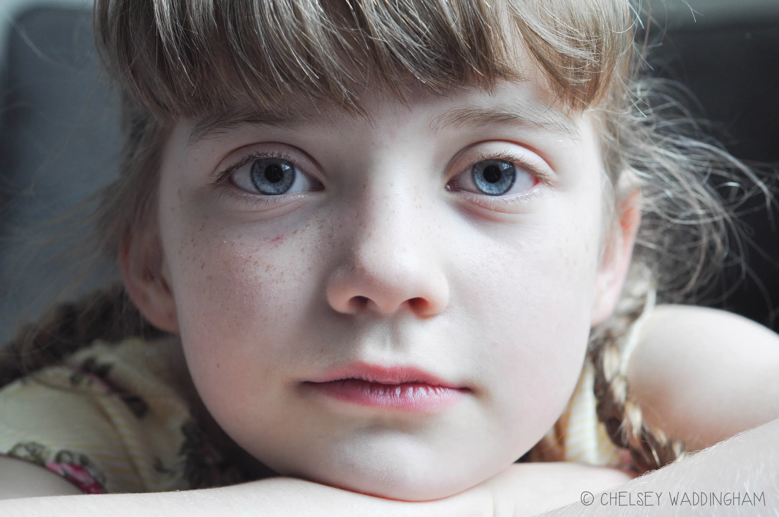 Ice  blue eyes.