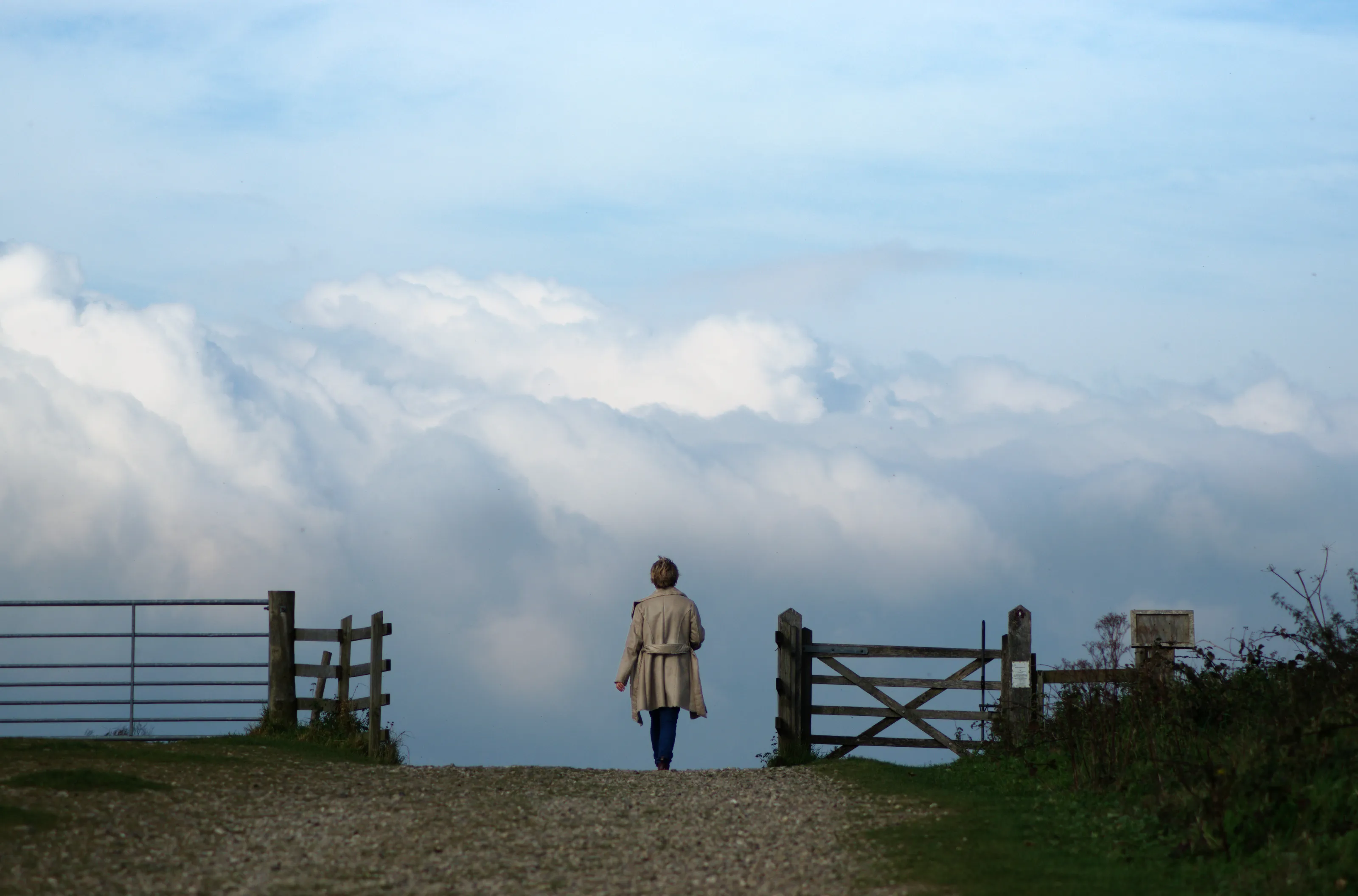 Kirsty walking into the clouds
