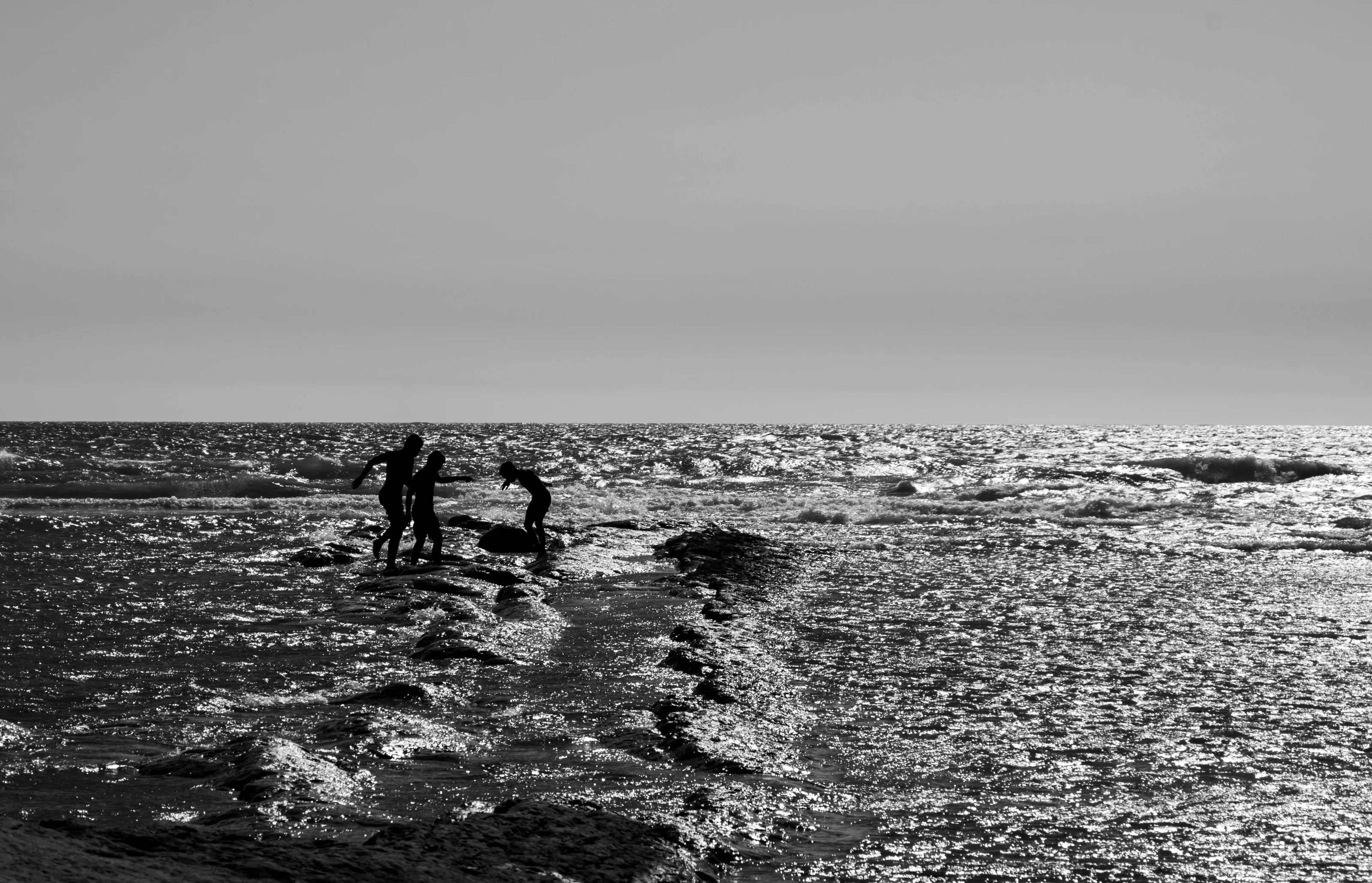 Threee shadows on beach