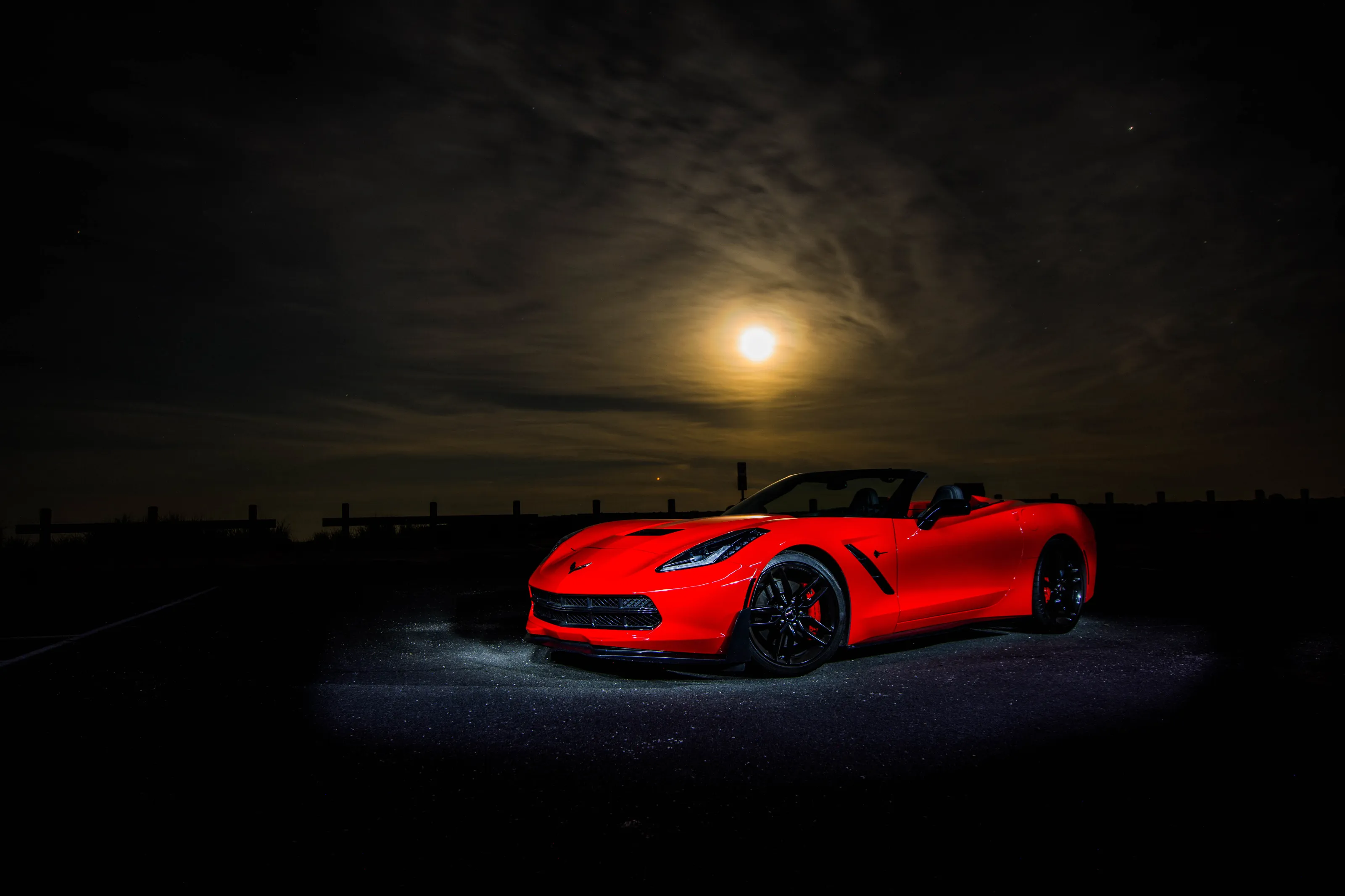 Corvette under a full moon