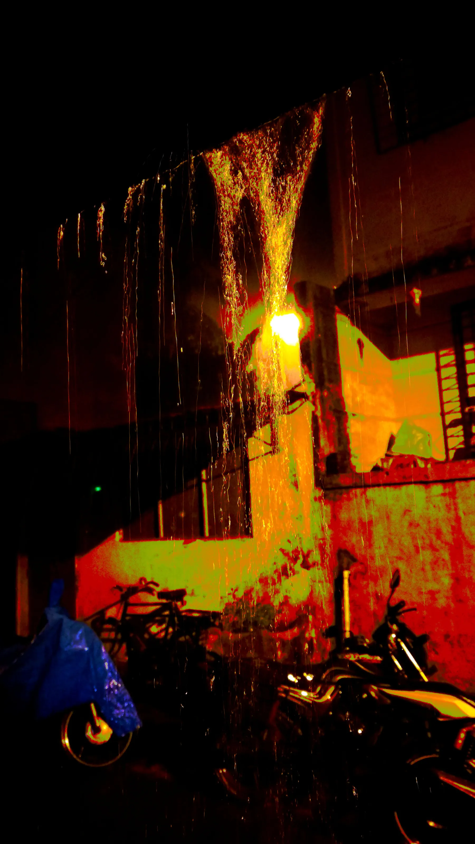 rain water sliding down from the roof.