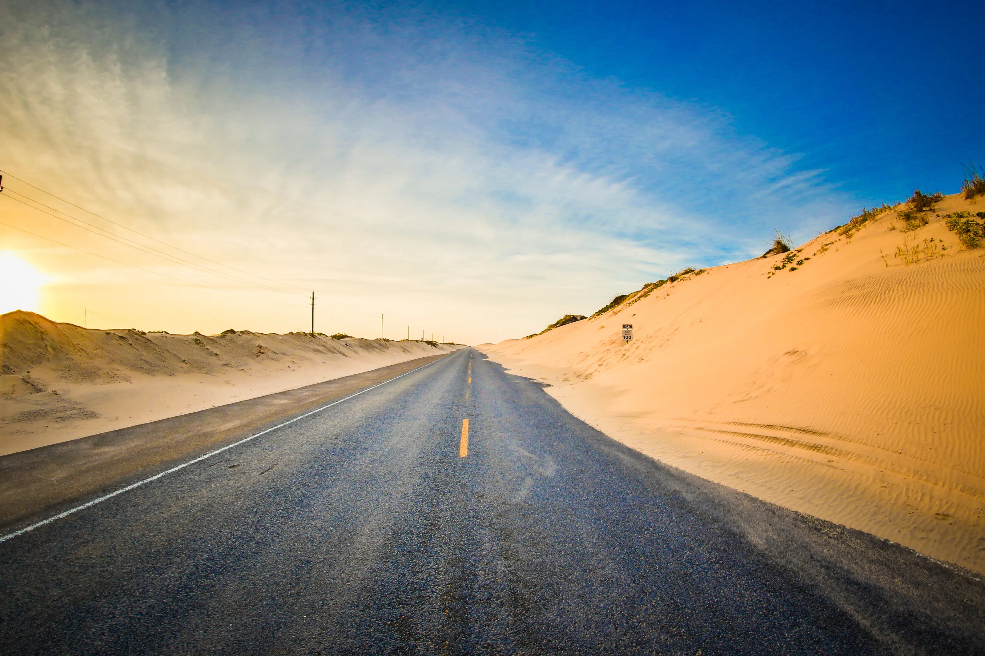 The road disappearing in the sand