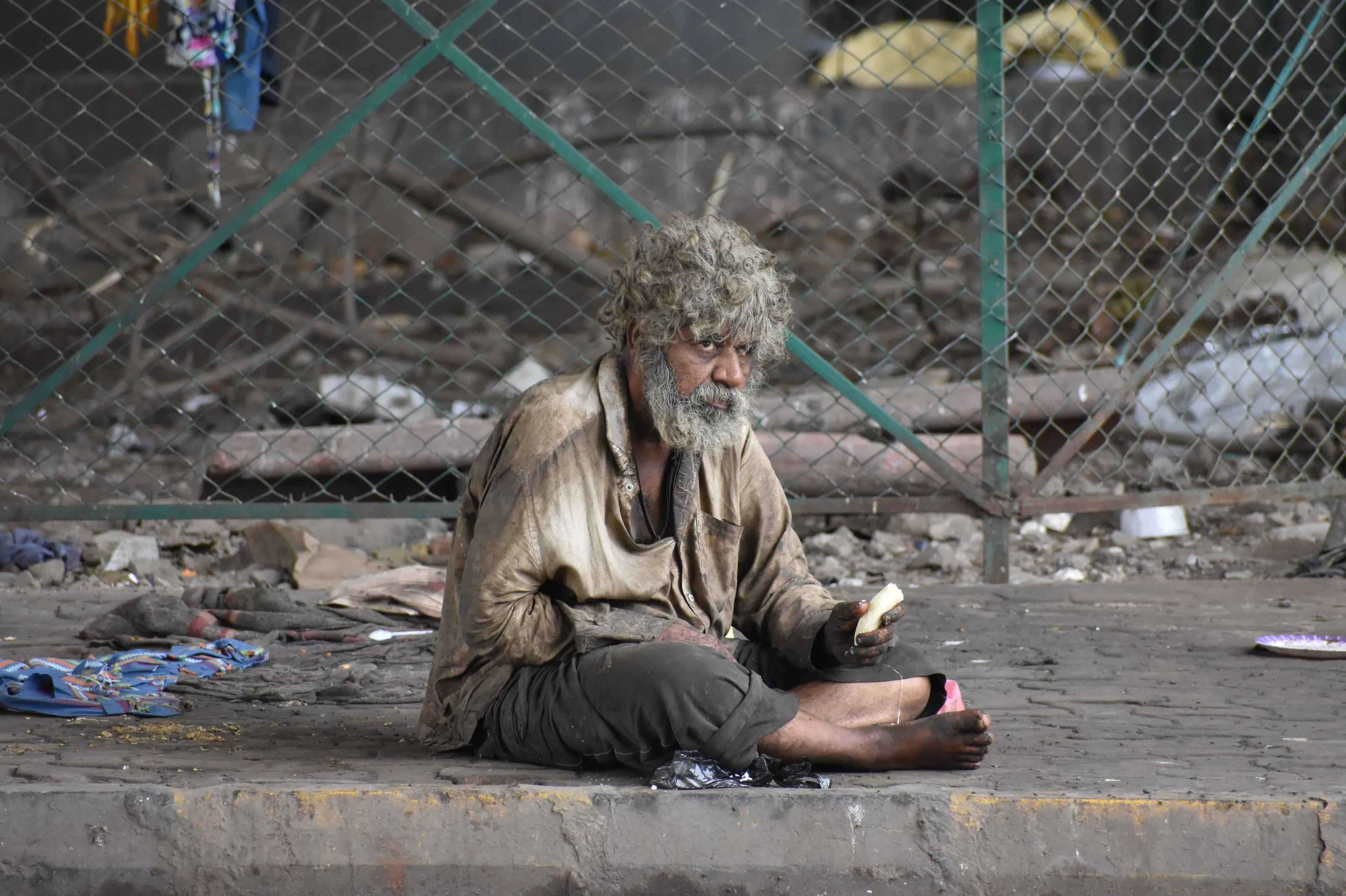 Hungry Beggar on Footpath