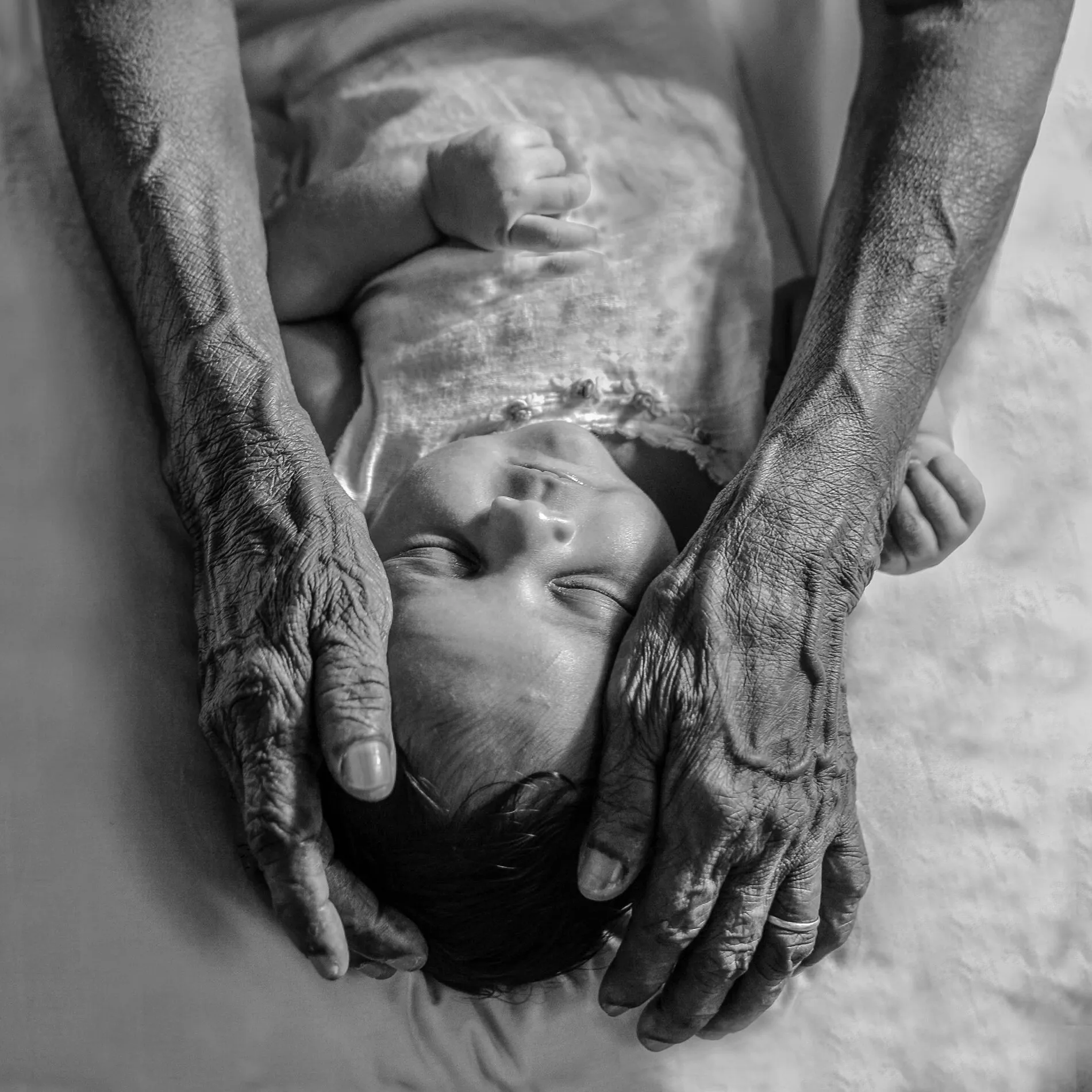 In the hand mother