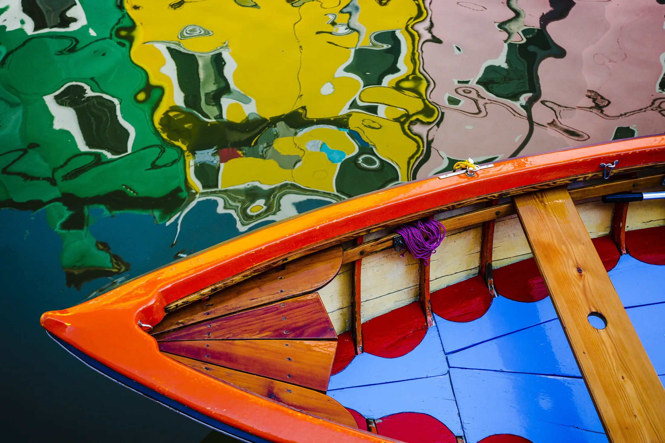 The colour of Burano - distorted colourful reflections  and boat