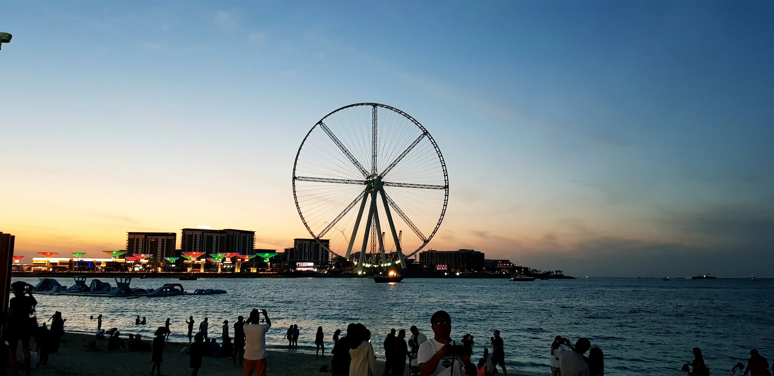 Ferris wheel sunset on beach