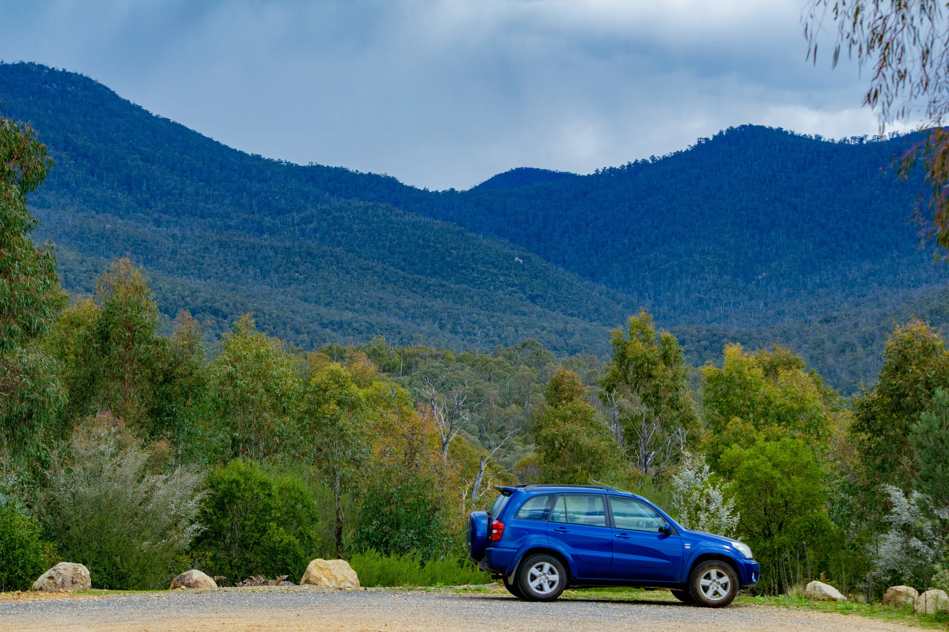 Car in front of mountains